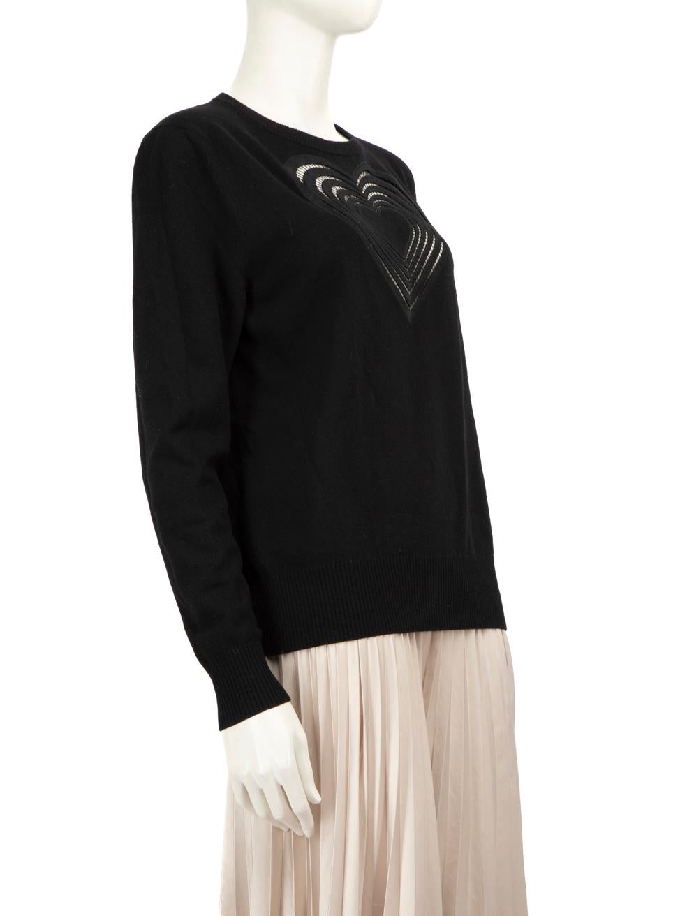 CONDITION is Very Good. Minor wear to the jumper is evident. A small hole on the front and back of the hem. A pull to the weave on the embroidered detailing and discolouration on the lower front right of this used Christopher Kane designer resale