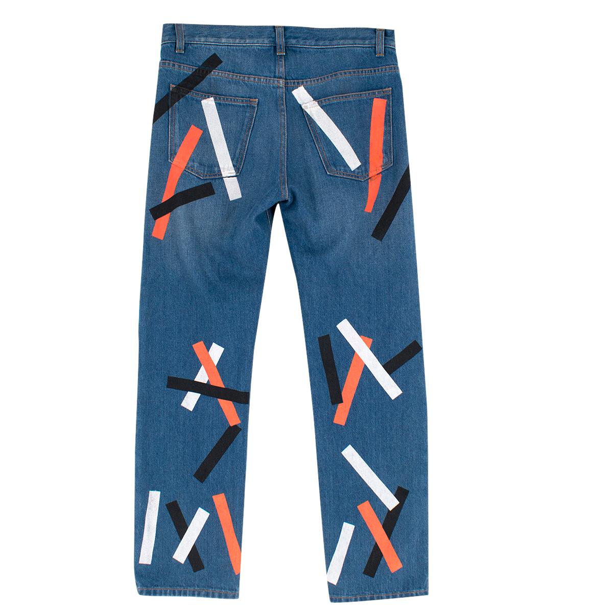 Christopher Kane Denim Jeans with Multicolor Paint Detail

-Blue denim, 100% cotton
-Orange/black/white paint stripes 
-High-waisted fit
-Two functional front and back pockets
-Silver zip and button closure
-Neon yellow strip of lining on interior
