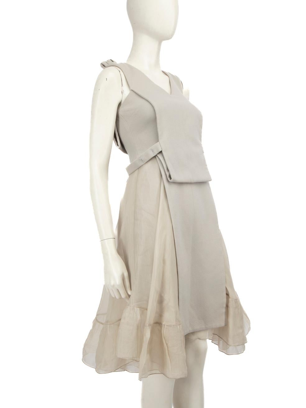 CONDITION is Very good. Hardly any visible wear to dress is evident on this used Christopher Kane designer resale item.
 
 
 
 Details
 
 
 Grey
 
 Wool
 
 Dress
 
 Layered wool and silk
 
 V-neck
 
 Sleeveless
 
 Back zip fastening
 
 
 
 
 
 Made