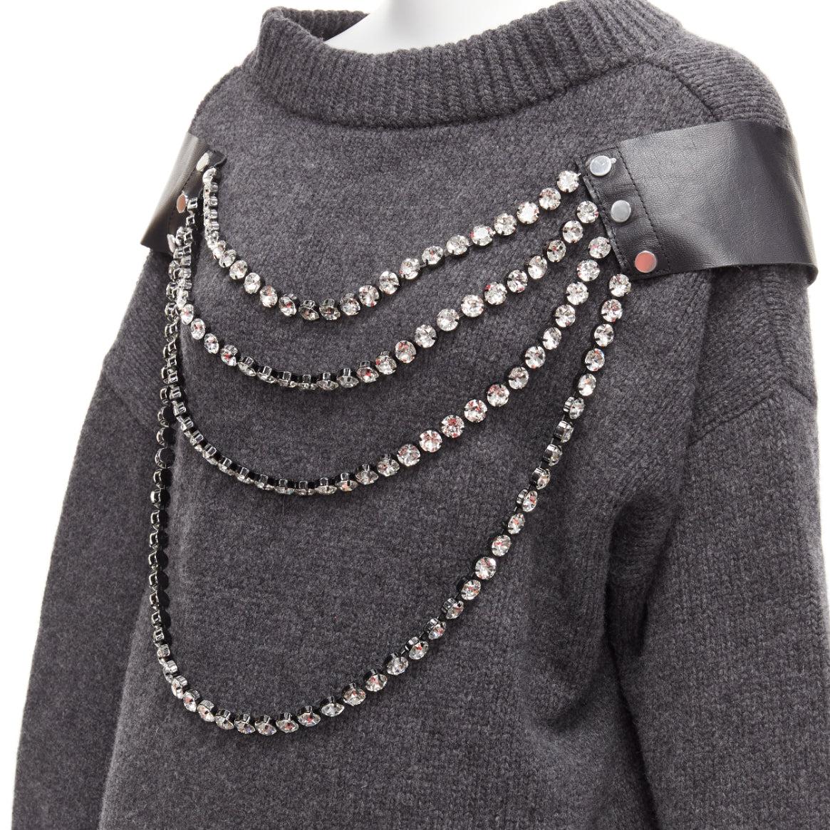 CHRISTOPHER KANE grey wool rhinestone chain harness oversized sweater dress XS
Reference: AAWC/A00639
Brand: Christopher Kane
Material: 100% Wool
Color: Grey, Black
Pattern: Solid
Extra Details: Leather and jewel embellished chains attached at snap