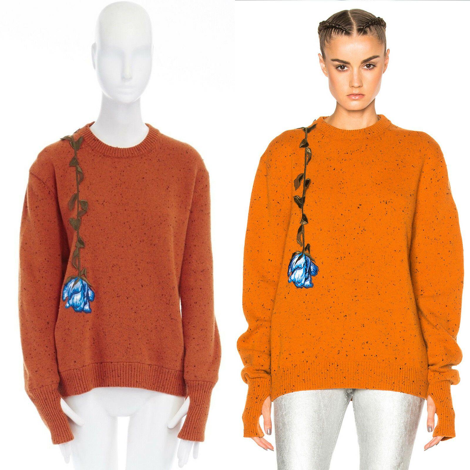 CHRISTOPHER KANE orange speckle virgin wool flower embroidered sweater top S
CHRISTOPHER KANE
Virgin wool. Orange with black speckle knit. 
Crew ribbed neck. Flower embroidery patched at front. 
Long sleeve. Thumb hole at cuff. 
Made in