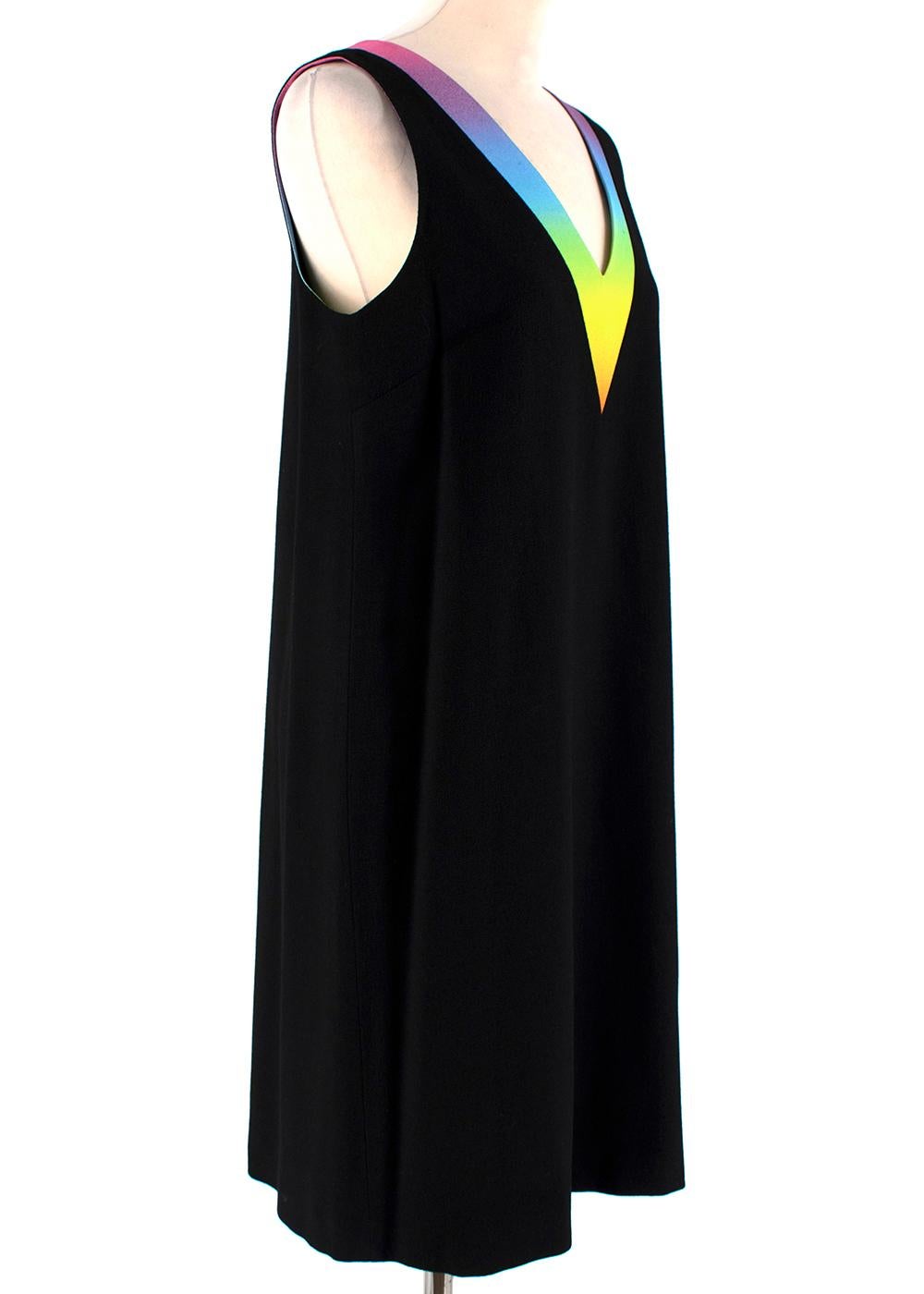Christopher Kane Rainbow Collar Black Wool Dress

-Made of a soft wool textured crepe 
-Beautiful rainbow gradient panel inserto to the collar 
-V shaped neckline 
-Luxurious silk lining 
-Zip fastening to the back 
-Timeless classic cut with a