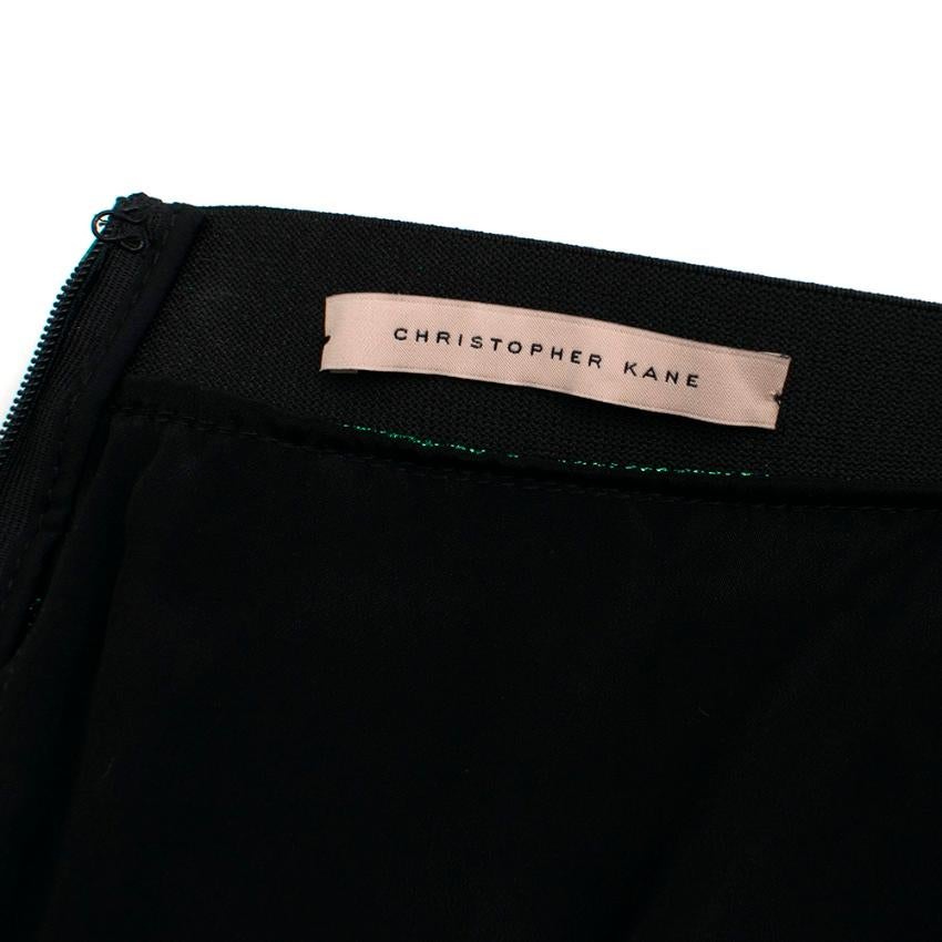 Christopher Kane Silk Blend Green Pleated Midi Skirt 

- Pleated Outer 
- Elasticated Waistband 
- Back Invisible Zip Closure 
- Mid-Length 

Materials 
70% Silk 
20% Polyester 
Lining 
75% Acetate 
25% Silk 

Dry Clean Only 

Made in Italy 

Please