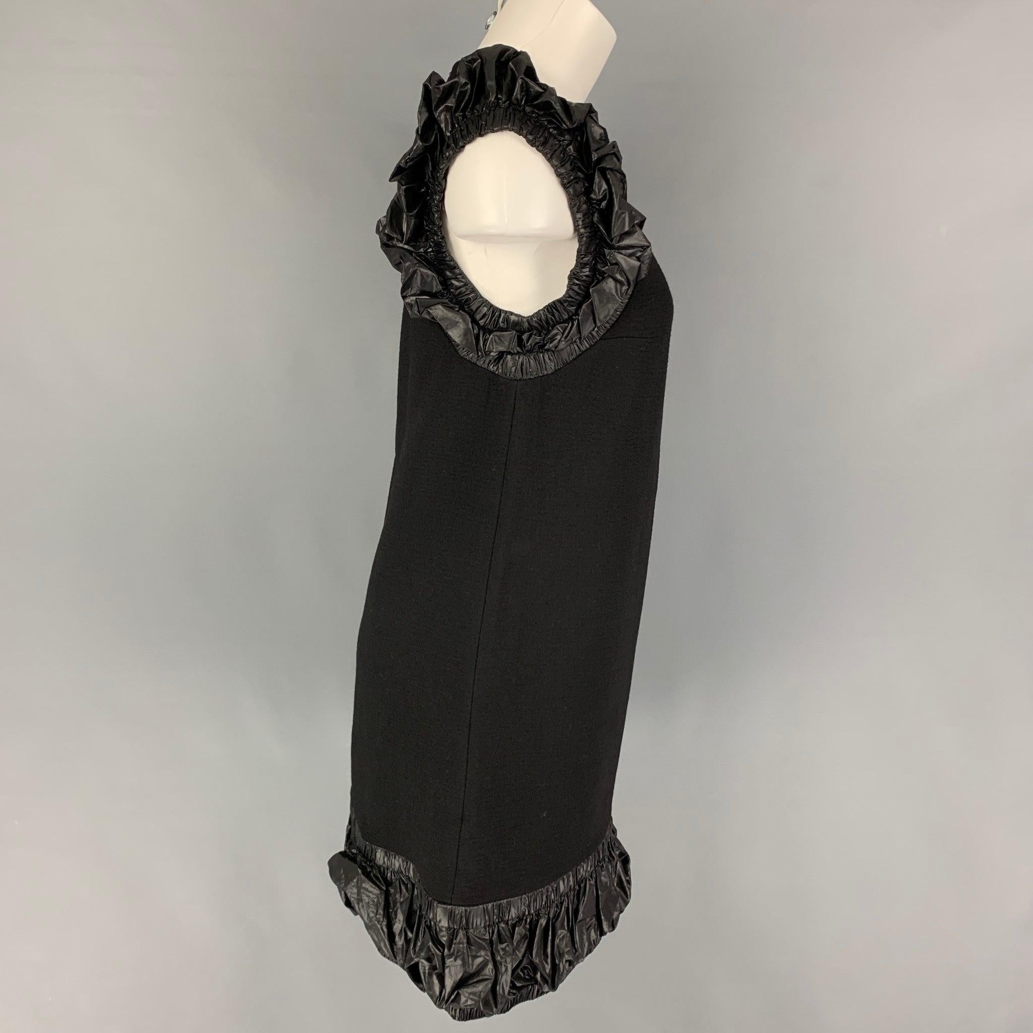 CHRISTOPHER KANE dress comes in a black polyester featuring a shift style, ruffled elastic hem, sleeveless, and a back zipper closure. Made in Italy.
Very Good
Pre-Owned Condition. 

Marked:   UK 8 / US 4 / EU 36 

Measurements: 
 
Shoulder: 16.5