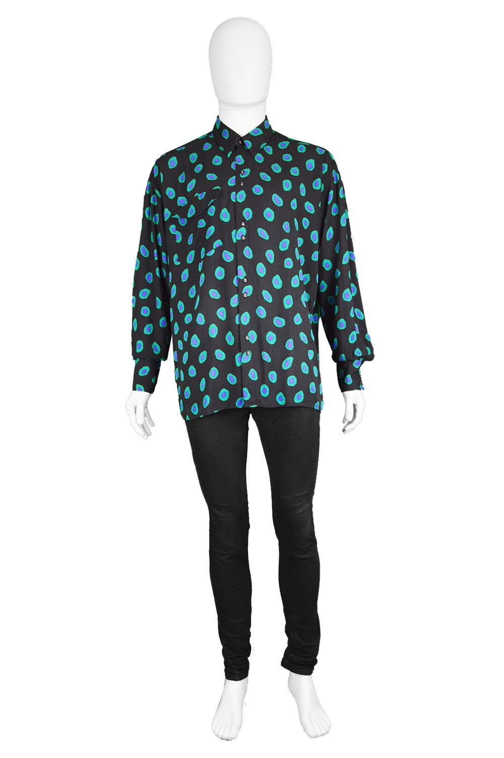 Christopher New Vintage Men's Long Sleeve Black & Green Rayon Shirt, 1990s

Click 'CONTINUE READING' below for Size & Description.

Size: Marked M but this gives a loose, oversized fit as pictured. Please check measurements. 
Chest - 50” /