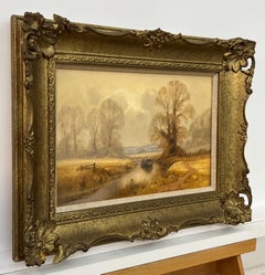 Boat on the River in the English Countryside with Winter Trees in the Sunshine