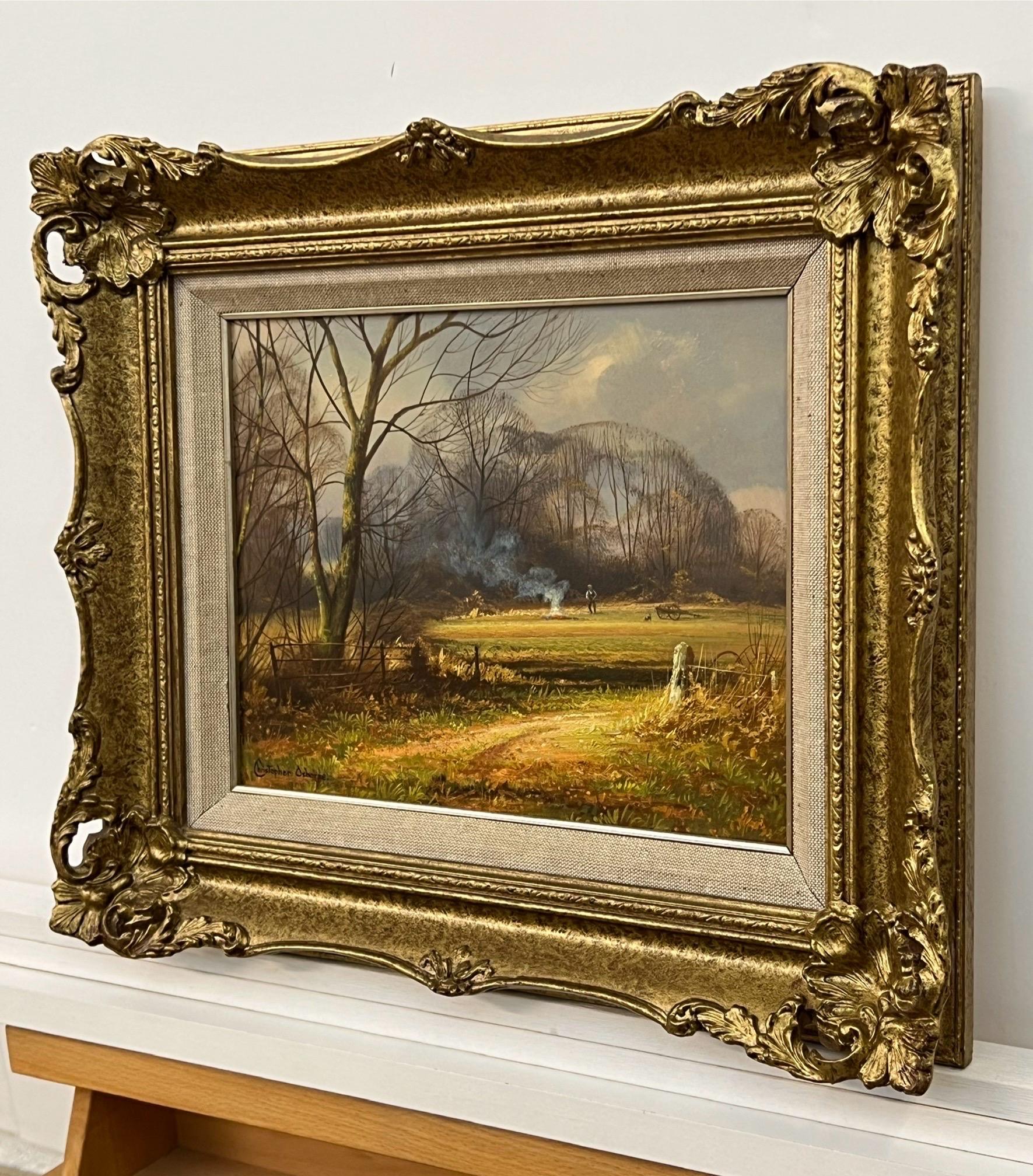 Farm in the Woods at Winter in the English Countryside with Warm Brown Colours by 20th Century British Artist, Christopher Osborne. 

Art measures 12 x 8 inches 
Frame measures 16 x 12 inches 

Signed, oil on board, presented in a gold