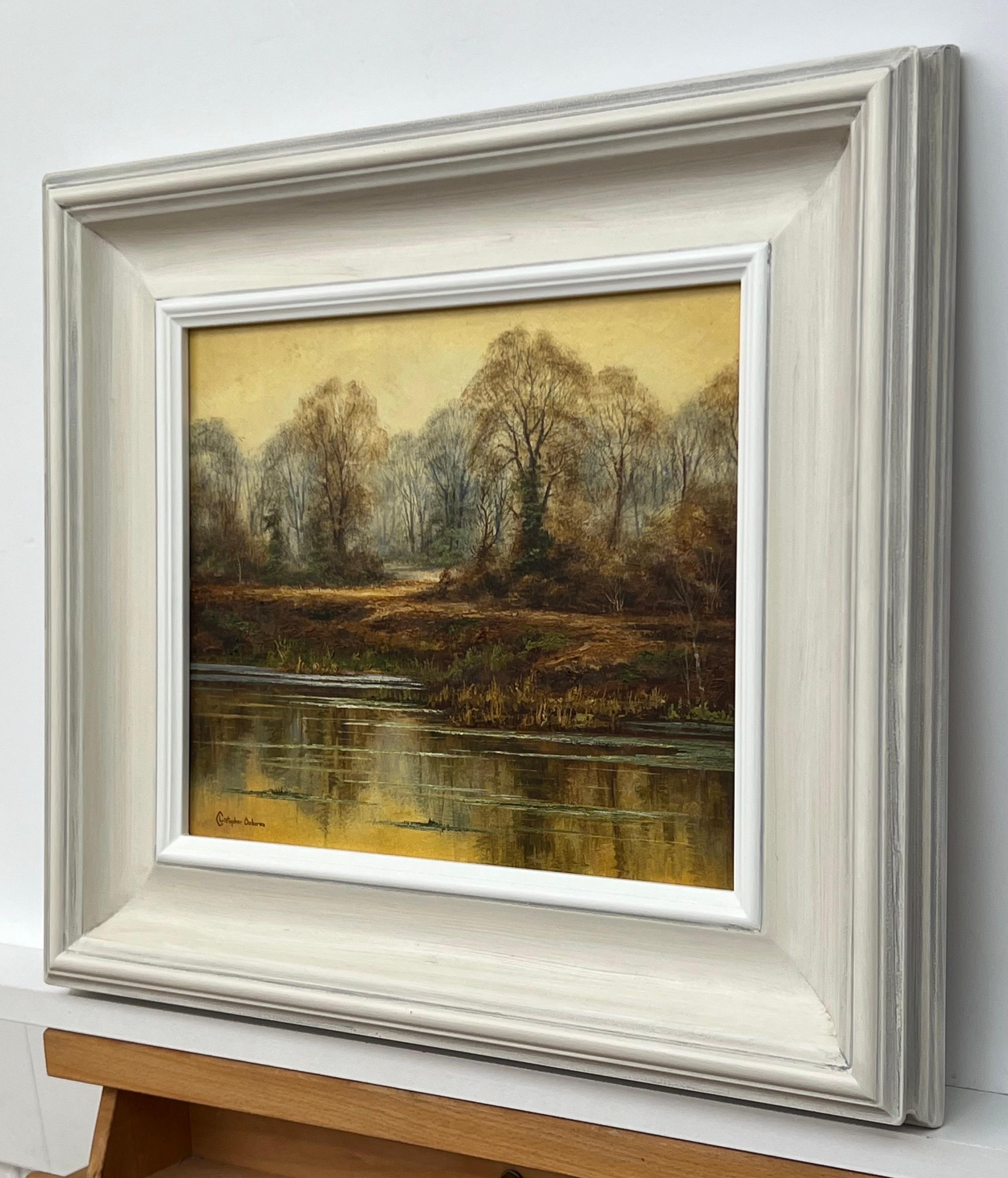 Reflections on Forest Pond in the English Countryside with Warm Yellows & Browns, by 20th Century British Artist, Christopher Osborne.

Art measures 12 x 10 inches
Frame measures 18 x 16 inches

Signed, unique original, oil on board, presented in a