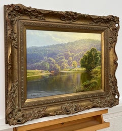 Summer Scene on Tree Lined River with Cattle in English Countryside in Sunshine