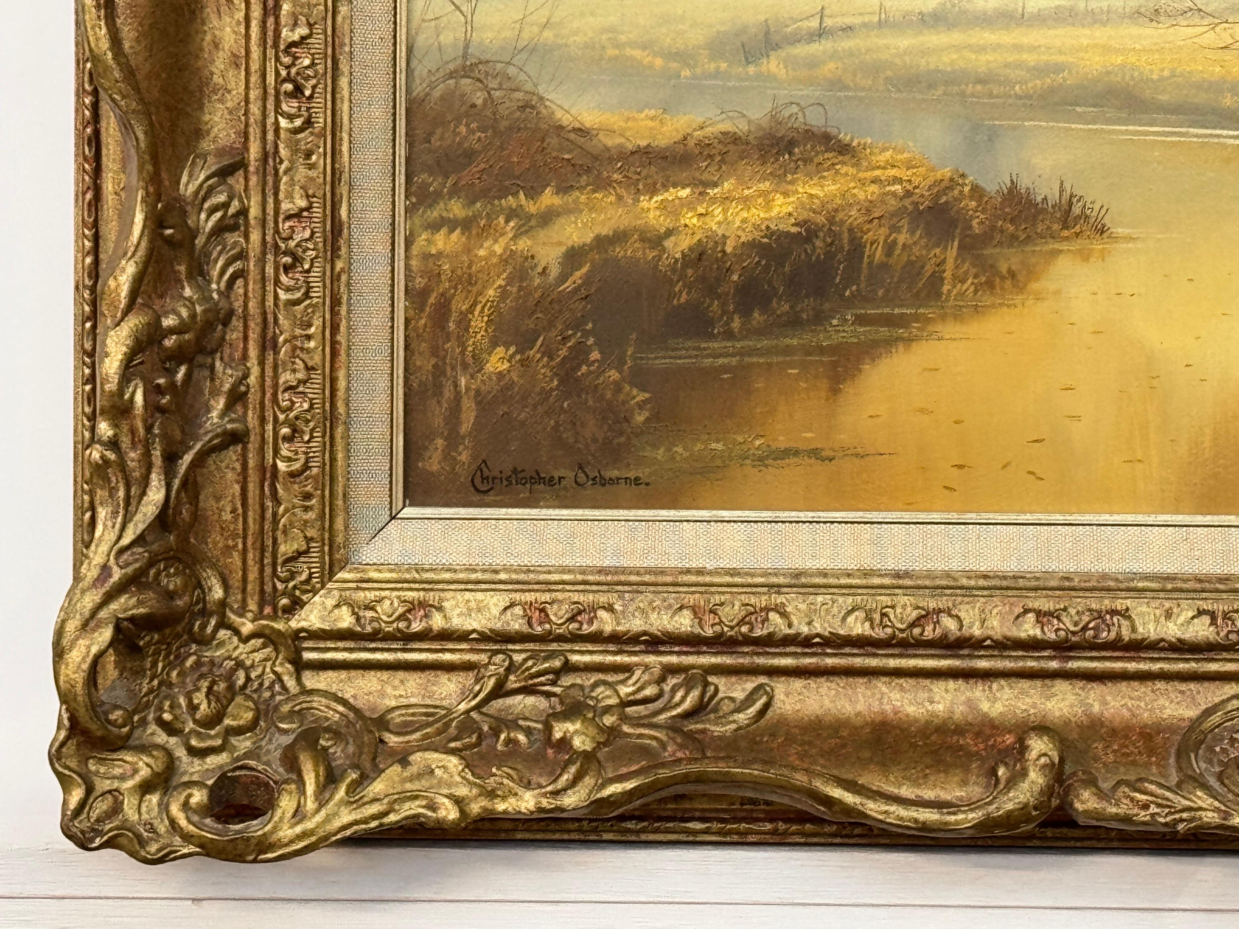 Paisaje brumoso de un río amarillo dorado con árboles invernales en la campiña inglesa en venta 2