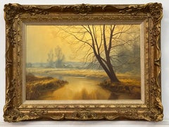 Misty Golden Yellow River Landscape with Winter Trees in the English Countryside
