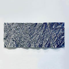 Christopher Prinz "Gran panel arrugado" en acabado pulido espejo