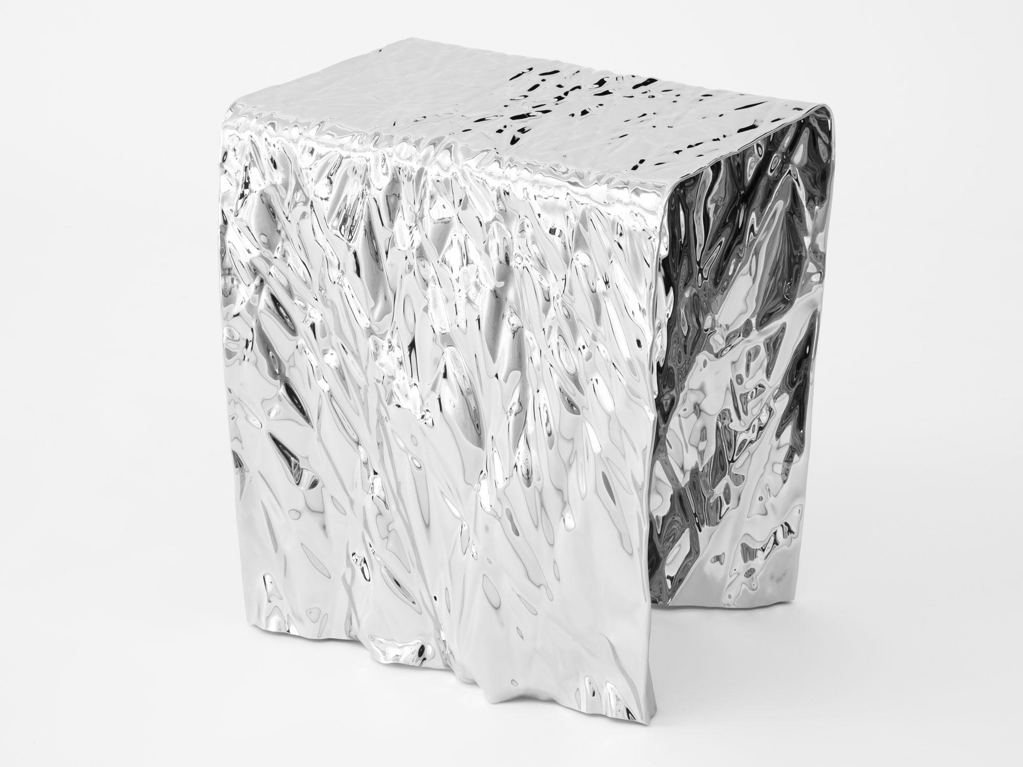 Wrinkled steel stool by Omaha-based designer Christopher Prinz, who achieves this unusual texture by repeatedly creasing a thin sheet of steel, resulting in a strong, rigid, and unique form. Hidden leveling feet protect surfaces and ensure
