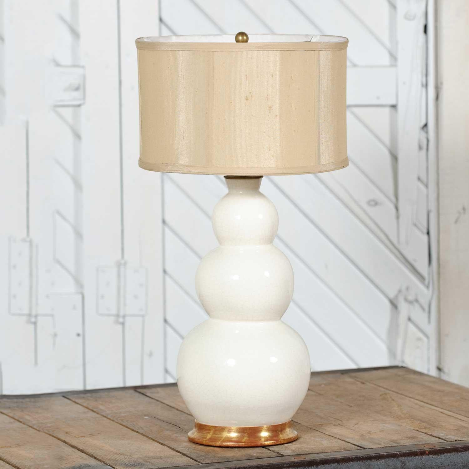 Handsome iconic ceramic lamp by Christopher Spitzmiller in his white blanc de chine color and glaze and the large size three ball design with the Spitzmiller label. It is in fabulous vintage condition with no flaws we have discovered. It does not