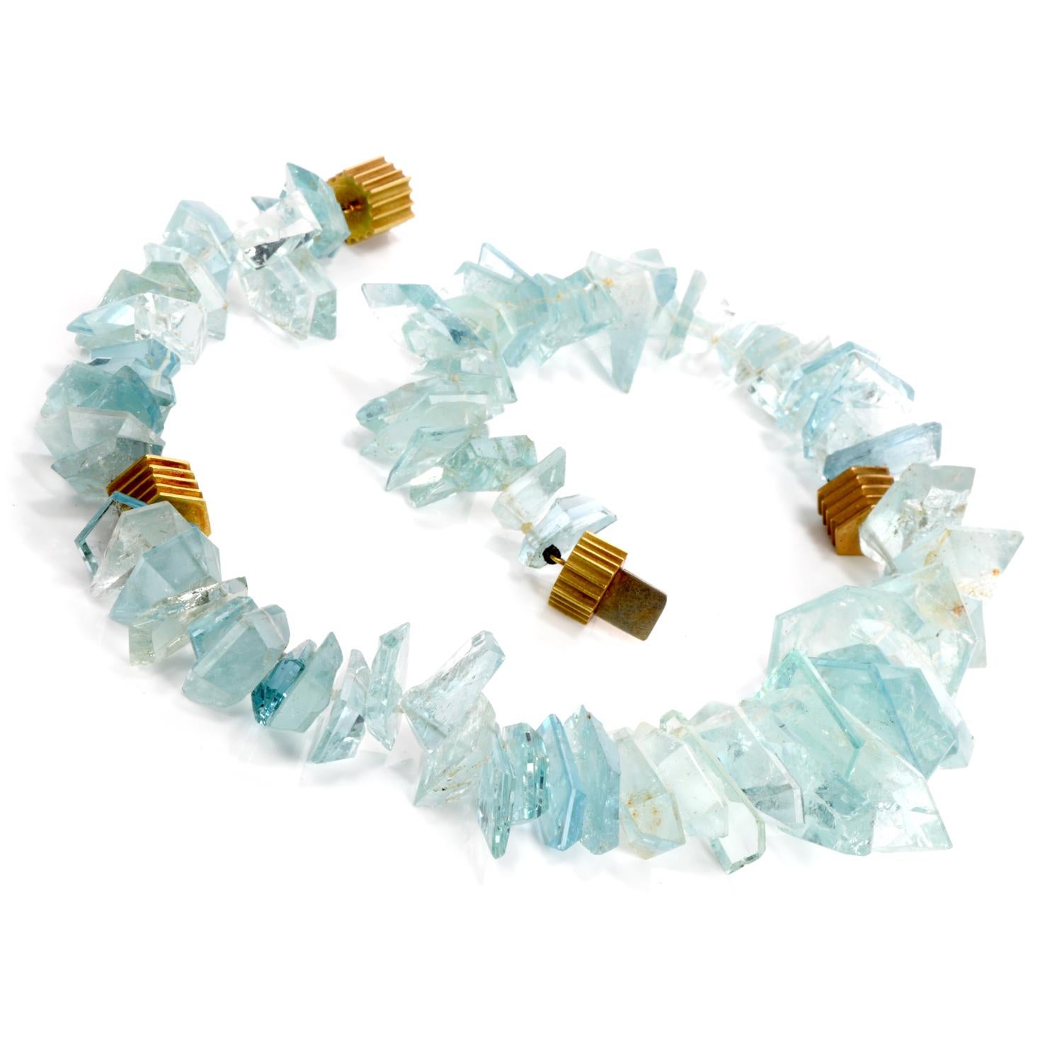 Aquamarine 18k gold necklace, design by Christopher Walling with Mirror-cut Natural aquamarine Gems. Necklace weighing  approx. 196.2 grams

 

DESIGNER: CHRISTOPHER WALLING 

MATERIAL: 18k Gold
GEMSTONE: Aquamarine over  Approx. 800.00