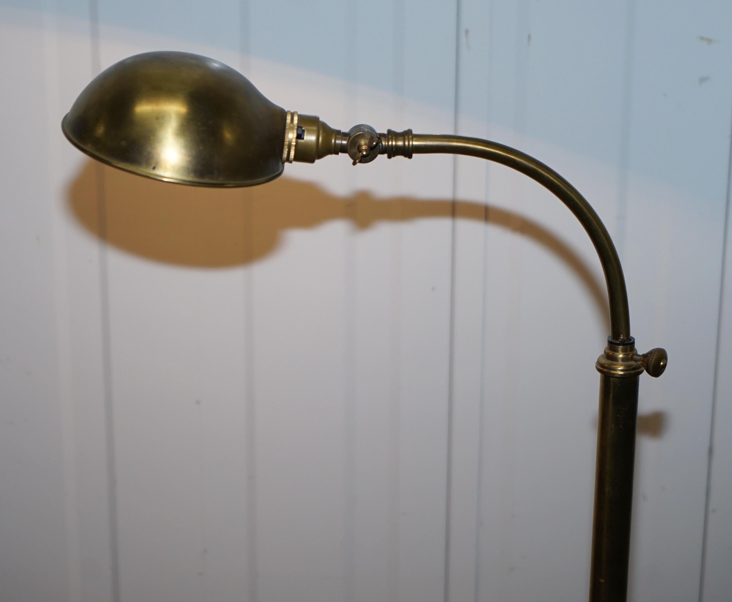 We are delighted to this lovely RRP £1365 Christopher Wrays lighting Emporium floor standing lamp in matte brass

A very good looking piece, its height adjustable as you can see with a pivoted shade so you can change the angle of the light