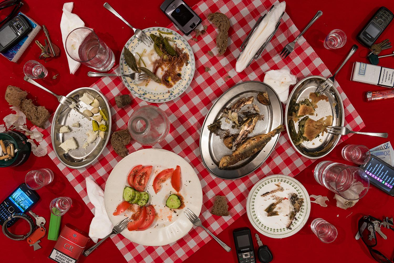 This photograph belongs to the series "Conversations." Evoking Dutch still-life as inspiration, these beautiful, contemporary tabletops contemplate technology's implications upon human interaction and memory. Shared meals with friends and family