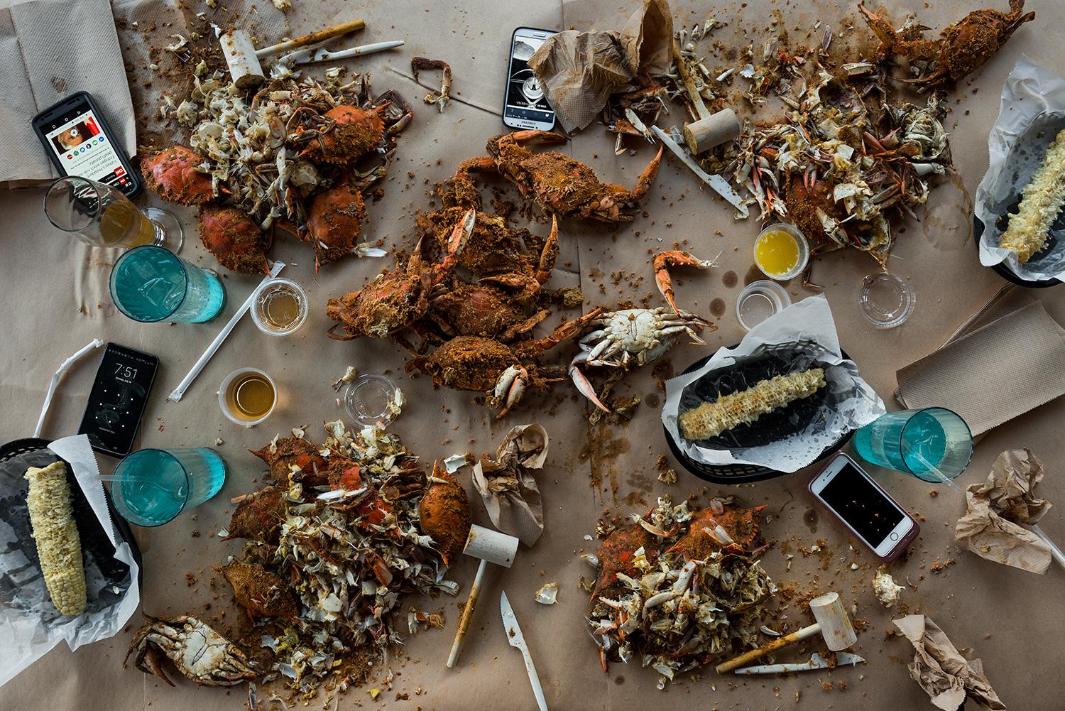 This photograph belongs to the series "Conversations." Evoking Dutch still-life as inspiration, these beautiful, contemporary tabletops contemplate technology's implications upon human interaction and memory. Shared meals with friends and family