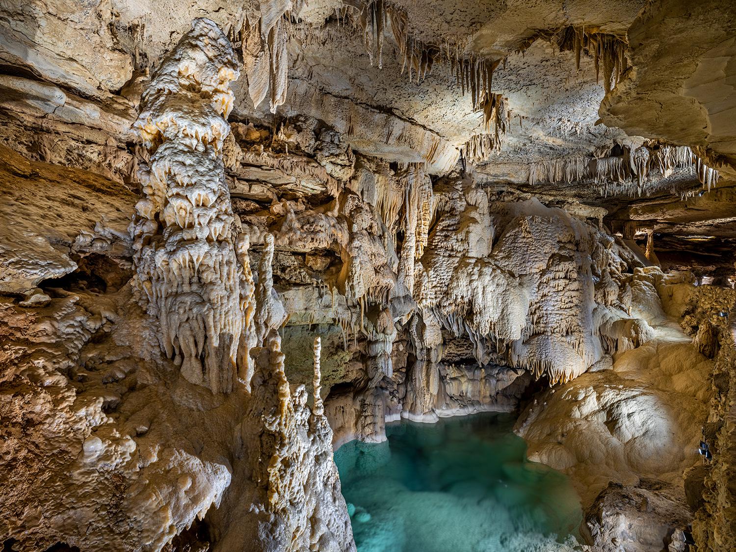 "RESPLENDENCE OF ANTIPODES
In the scope of civilization, the subterranean realm remains largely unchanged. Isolated in darkness for hundreds of millions of years, the sunless underworld encompasses majestic ancient formations gradually eroded into