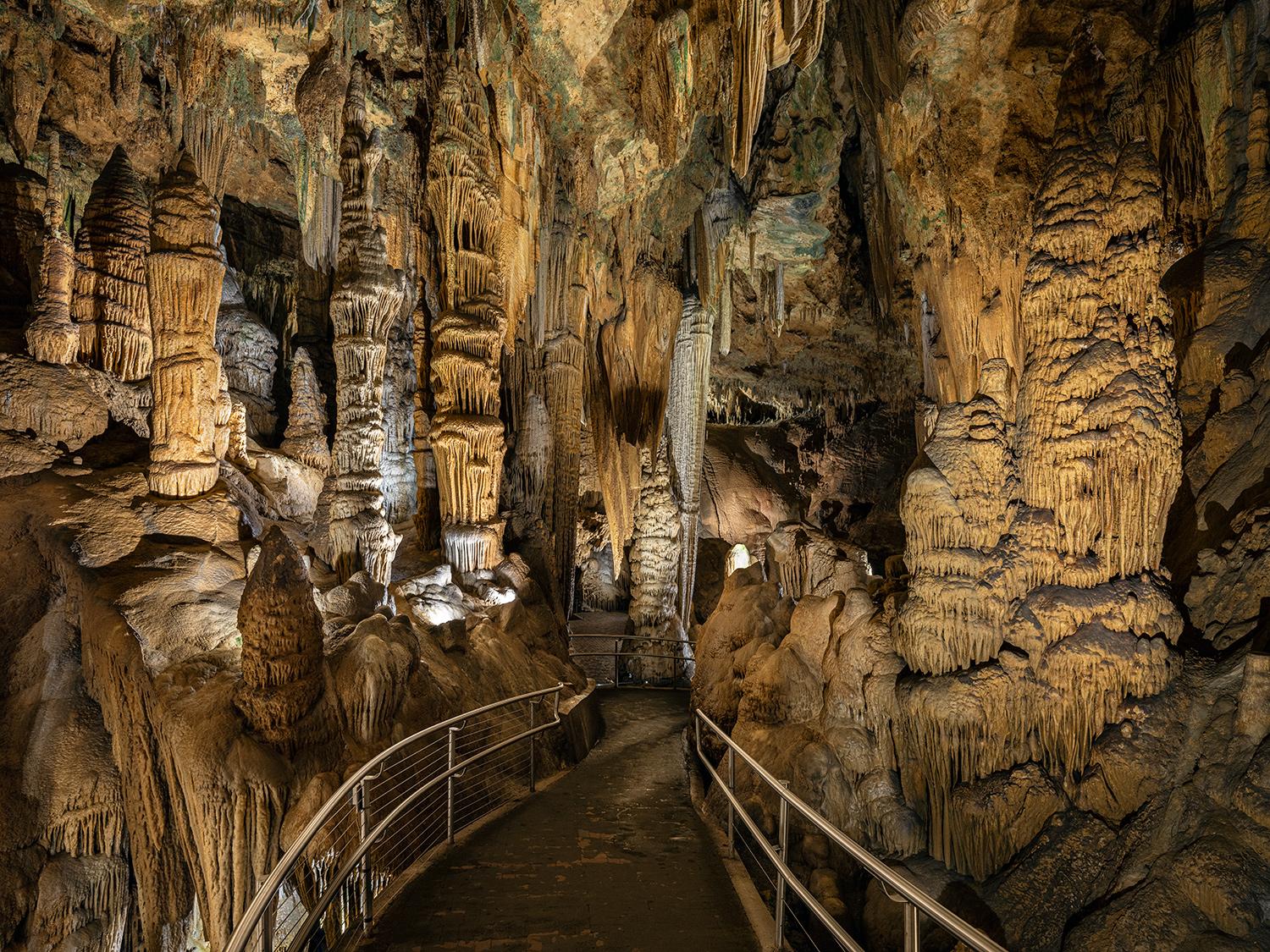 "RESPLENDENCE OF ANTIPODES
In the scope of civilization, the subterranean realm remains largely unchanged. Isolated in darkness for hundreds of millions of years, the sunless underworld encompasses majestic ancient formations gradually eroded into