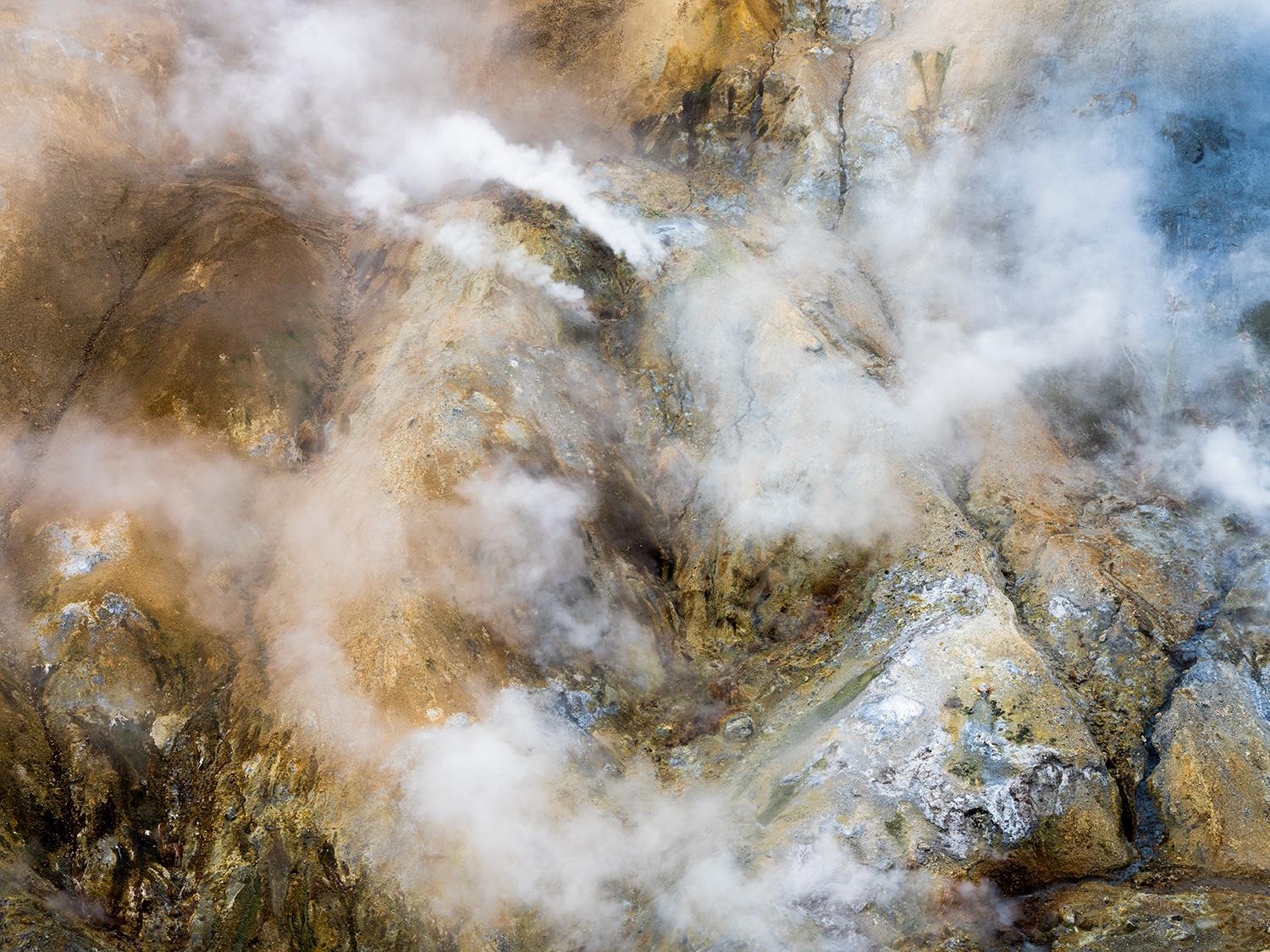 Hissing spitting vents and steaming fumaroles dot this icy-hot hillside in an abstract tableau of intriguing dynamism. 

Series: Ísland
Archival Pigment Platine Print	
All available sizes and editions: 
23" x 30” Edition Size: 10, Artist Proofs