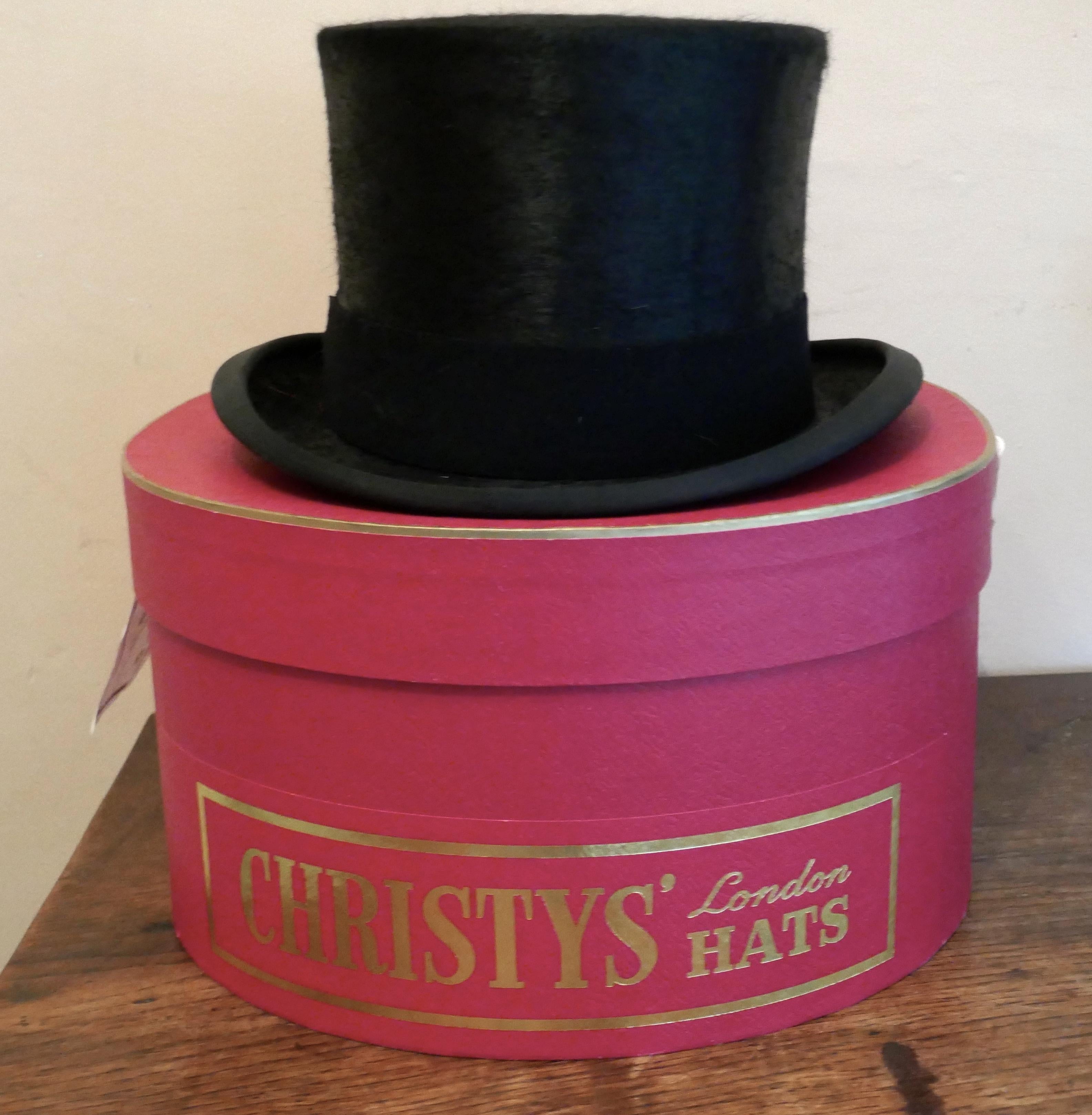 Christy’s Of London Top Hat, Evening Wear,Horse Riding, Dressage or Hunting

A Fine quality Hat, in Original Christy Box, 1” hat band, silk and leather Lined, size 63/4 inches
For Formal Dress, Dressage or Hunting
Worn only once, in good