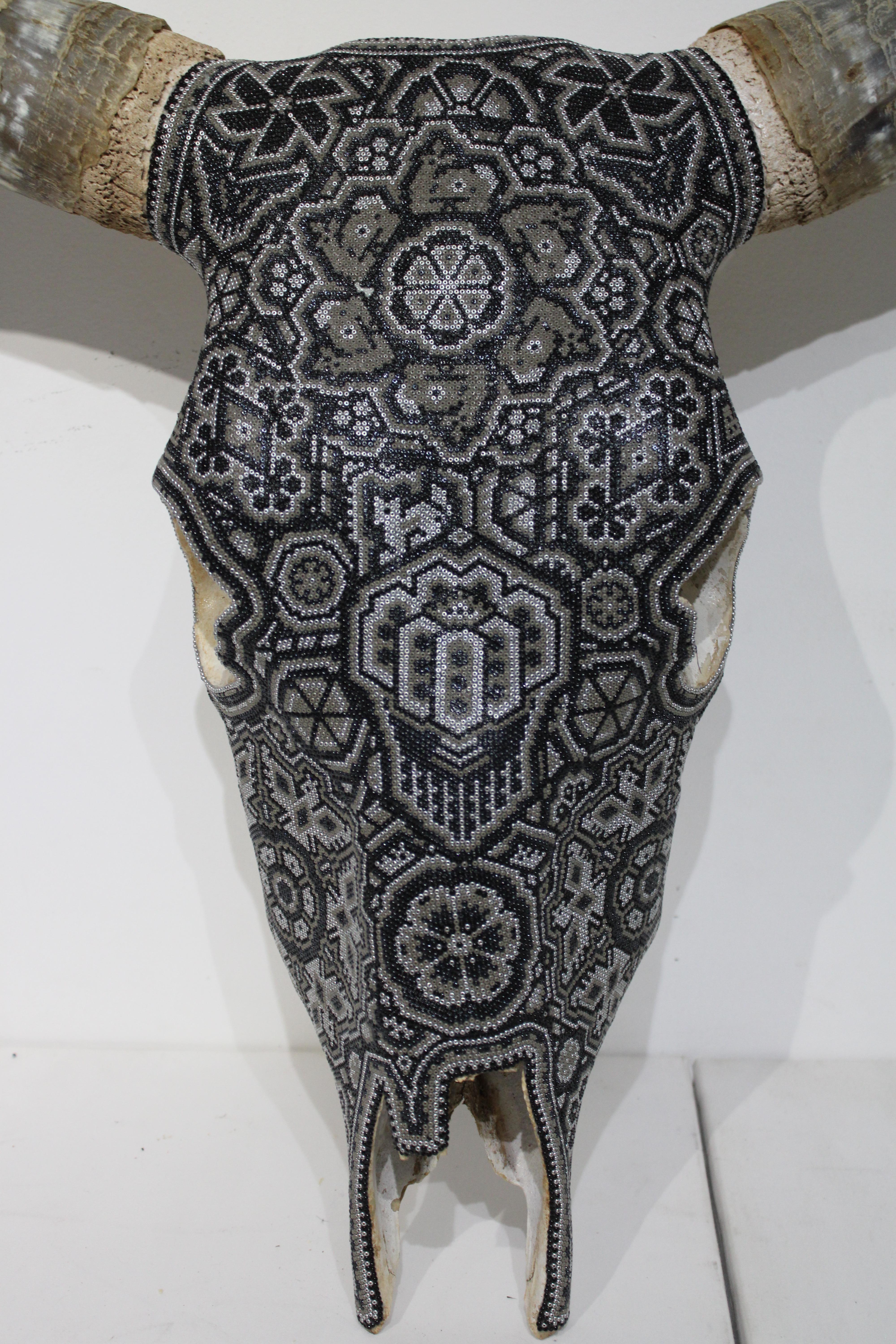 BULL SKULL . . . a more traditional HUICHOL style sculpture. Looks great on any wall in any room!!!

ALTERATION ART . . . is a collaboration process between Rick Wolfryd, fine artist and art dealer with over 40 years experience, and various Mexican