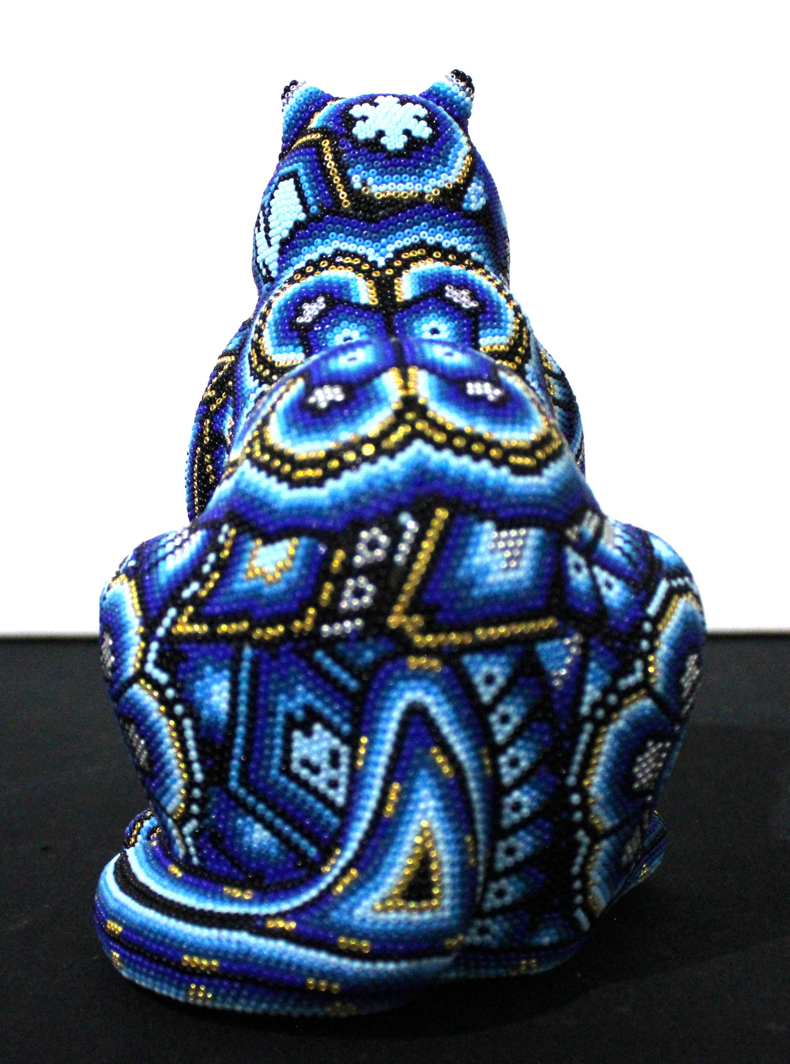 Bull Sculpture in Mexican Huichol Style 

AP. 0008 

ALTERATION ART . . . is a collaboration process between Rick Wolfryd, fine artist and art dealer with over 40 years experience, and various Mexican Huichol artists and Mexican Huichol art studios