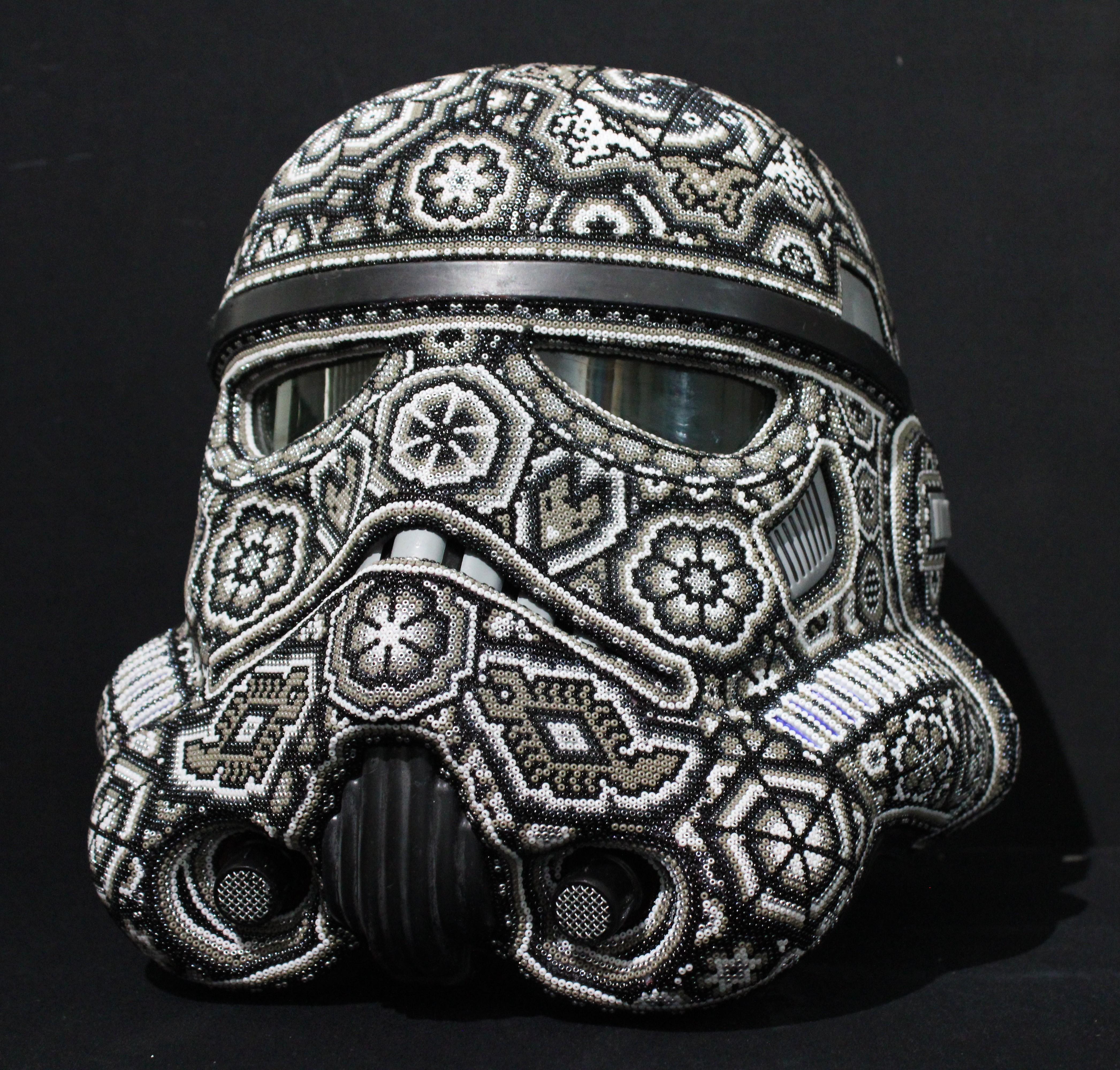 "STORMTROOPER HELMET" 

ALTERATION ART . . .is a collaboration process between Rick Wolfryd, fin artist and art dealer with over 40 years experience, and various Mexican Huichol artists and mexican Huichol art studios that Rick has been drwan to,