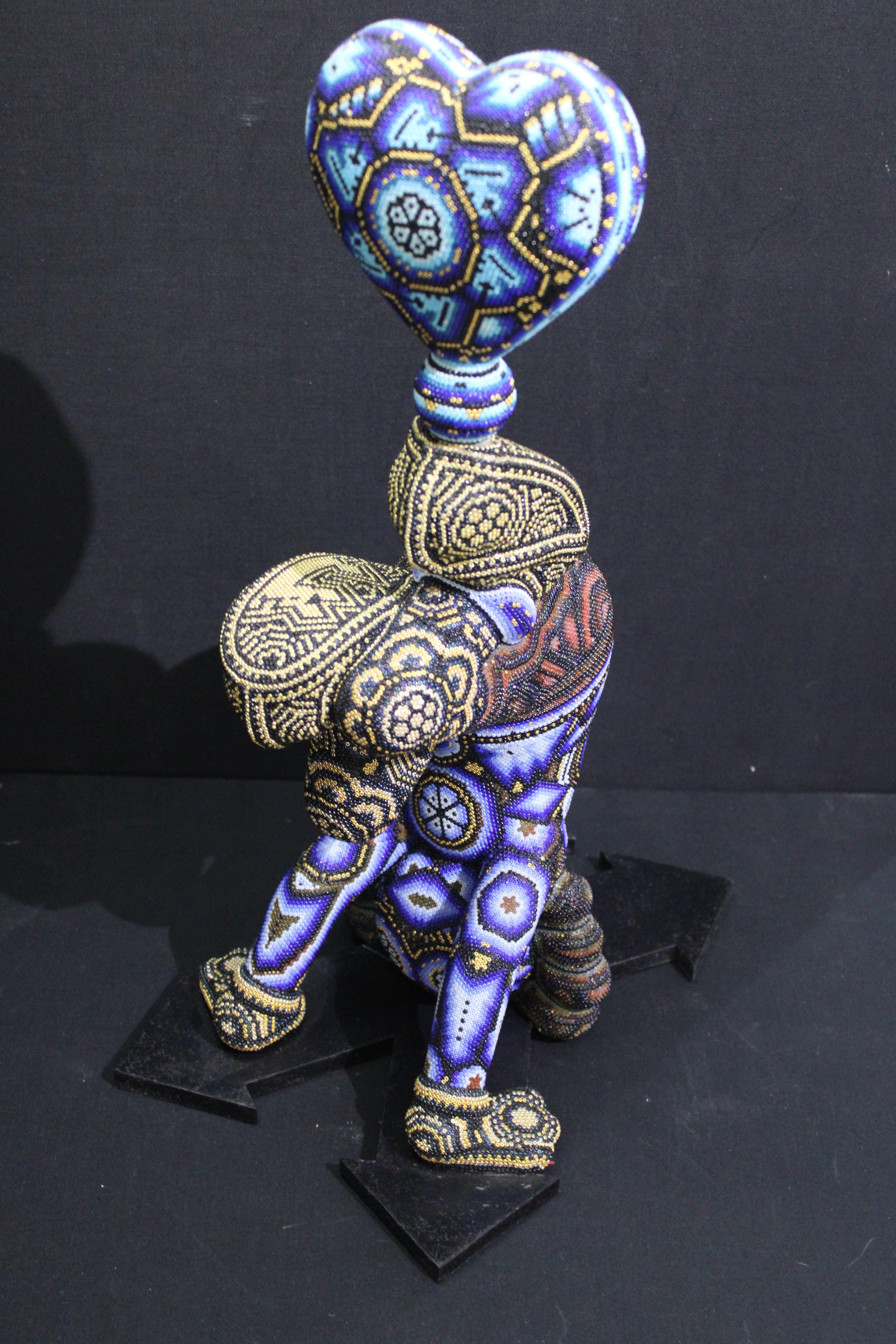 Huichol "Al revés me estás volviendo " Escultura de cuentas