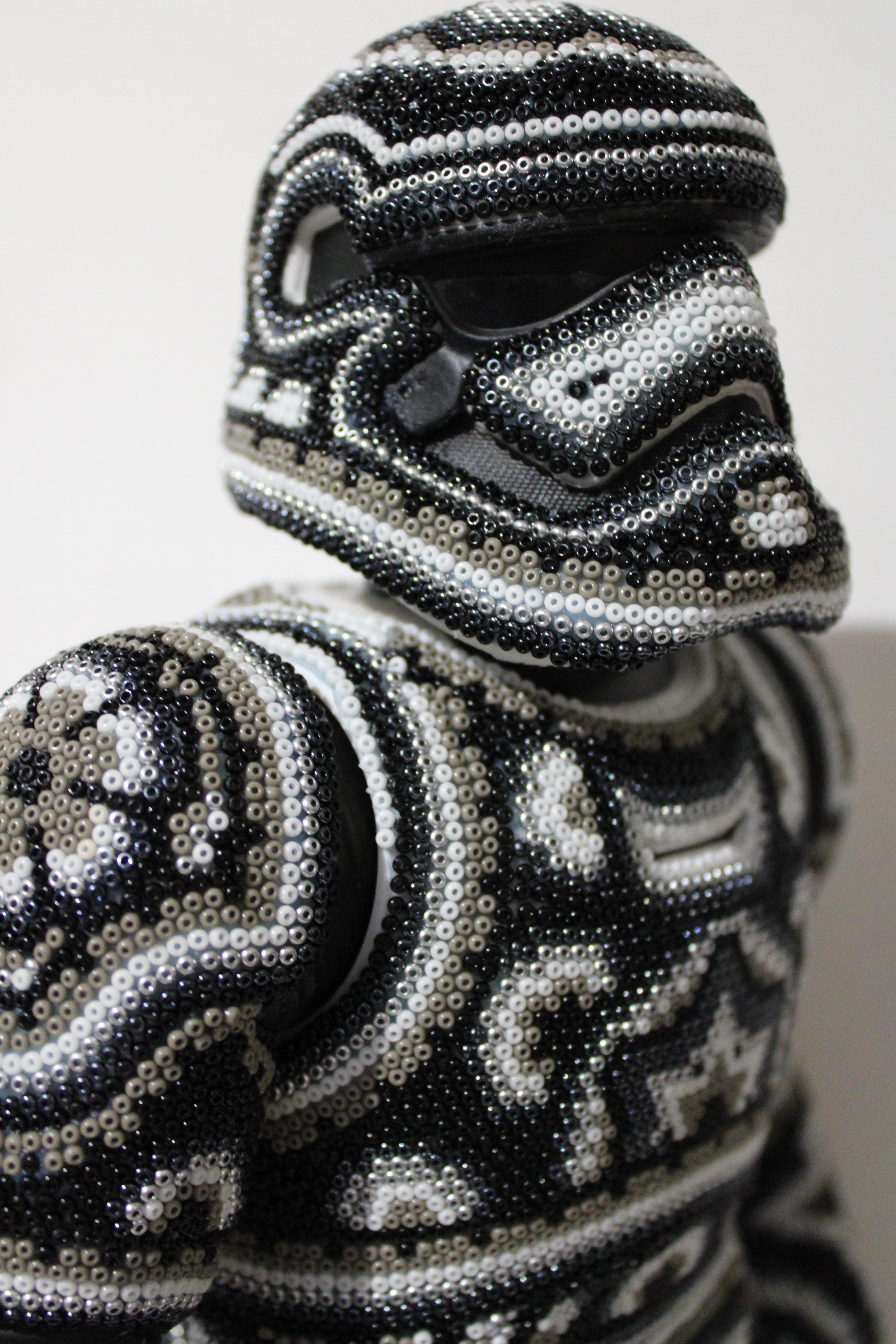 CHROMA aka Rick Wolfryd  Figurative Sculpture - "Stormtrooper" from Huichol ALTERATIONS Series