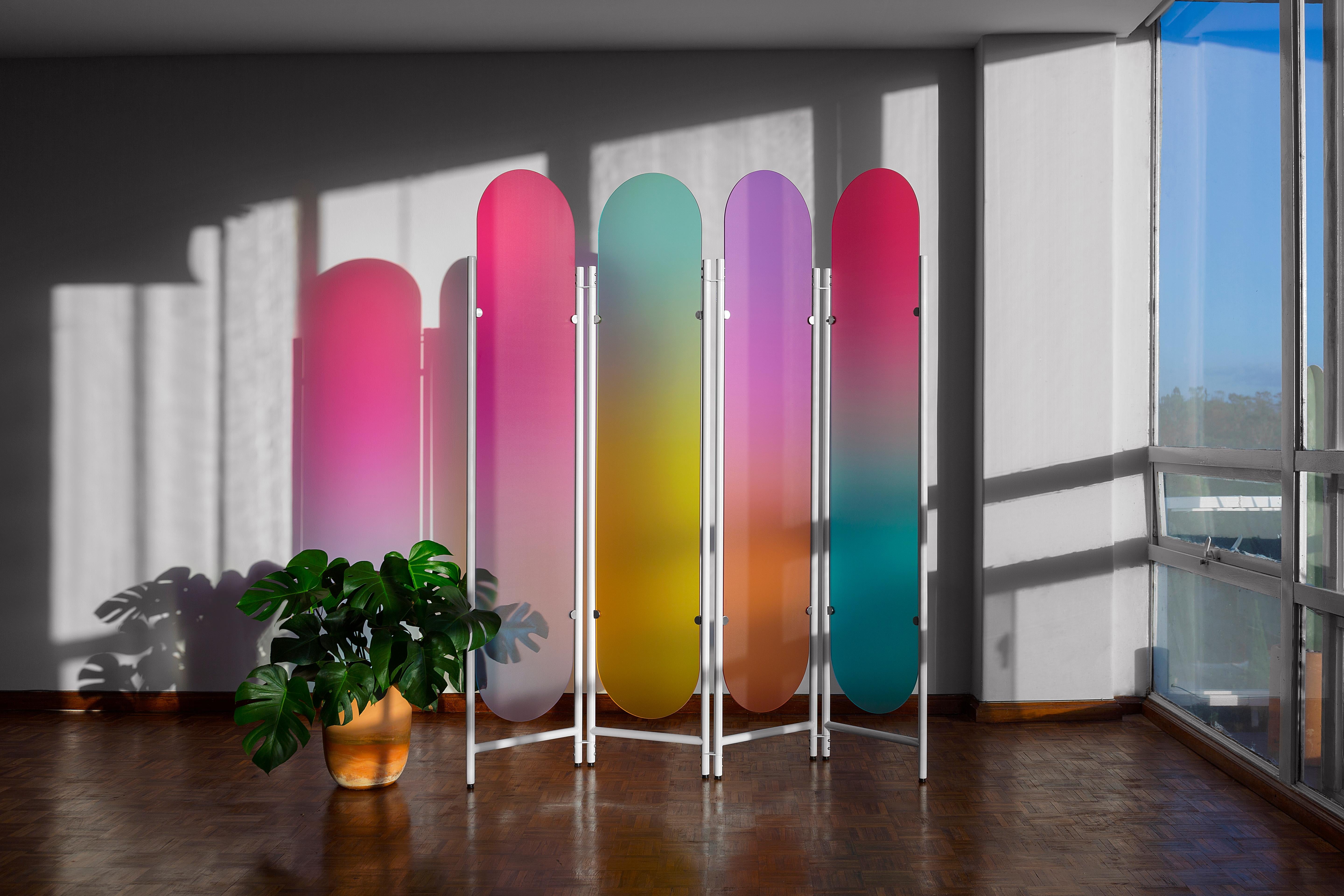 The Chroma room divider seeks to break the confines of its own materiality.
By filtering the light through, it magnifies its presence creating an effect where different shades of color mix and flood the space it inhabits
What happens if we think