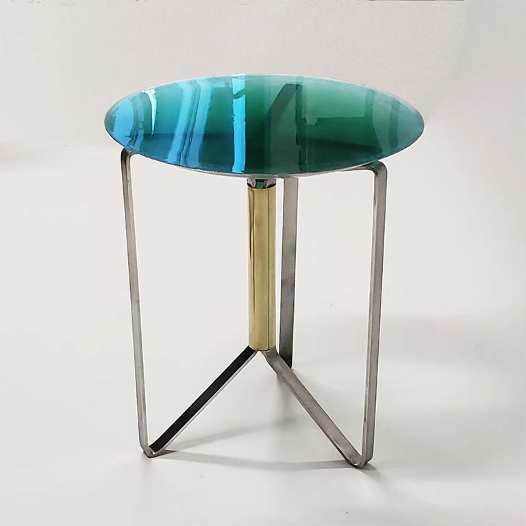 The first in a series, Chroma Table (Emerald) is a continuation of Jason's fascination with light, optics and the colours found in the natural world. This particular piece draws inspiration from the hot springs located in Yellowstone National Park,