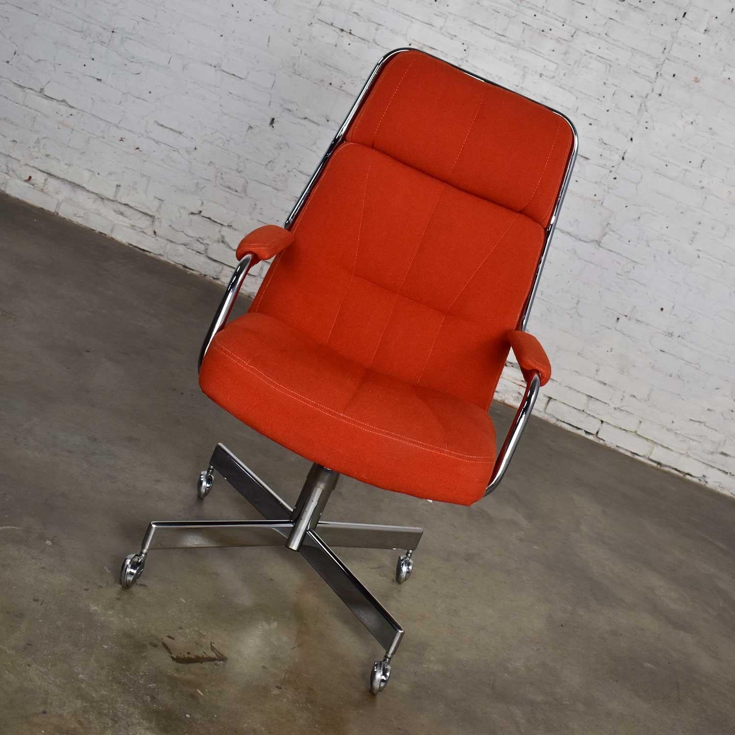 Stunning modern style Chromcraft high back office chair comprised of orange hopsack fabric on a chrome four prong X base with casters, adjustable height, and adjustable lean. Gorgeous vintage condition. Wearing its original fabric and has only