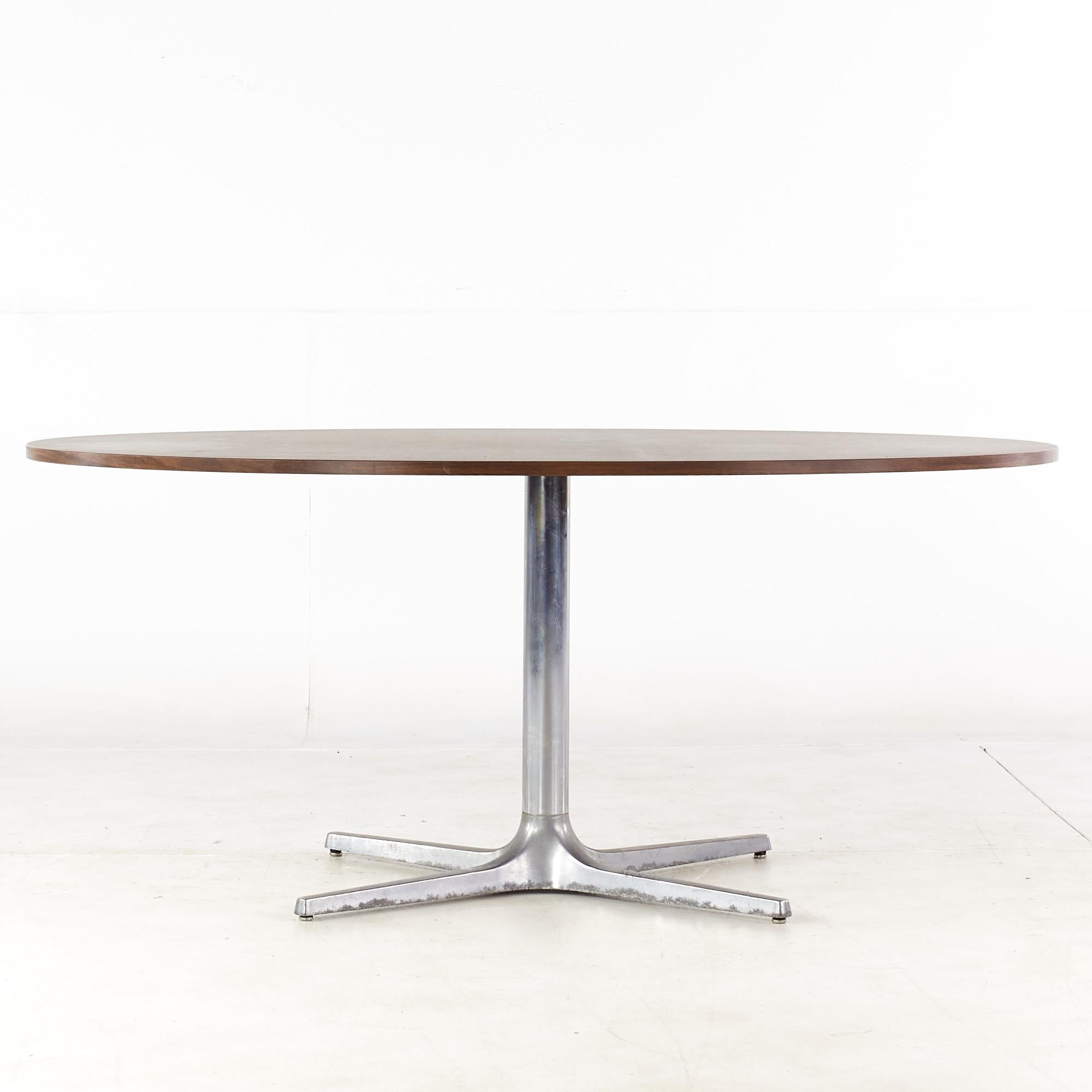 Chromcraft mid-century dining table with knoll style laminate top.

This table measures: 65.75 wide x 44.75 deep x 28.5 high, with a chair clearance of 27.75 inches.

All pieces of furniture can be had in what we call restored vintage condition.