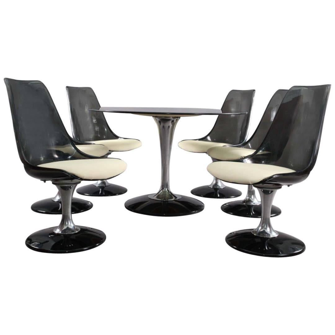 Chromcraft Smoke Lucite Dining Set : Six chaises tulipes pivotantes et table ovale