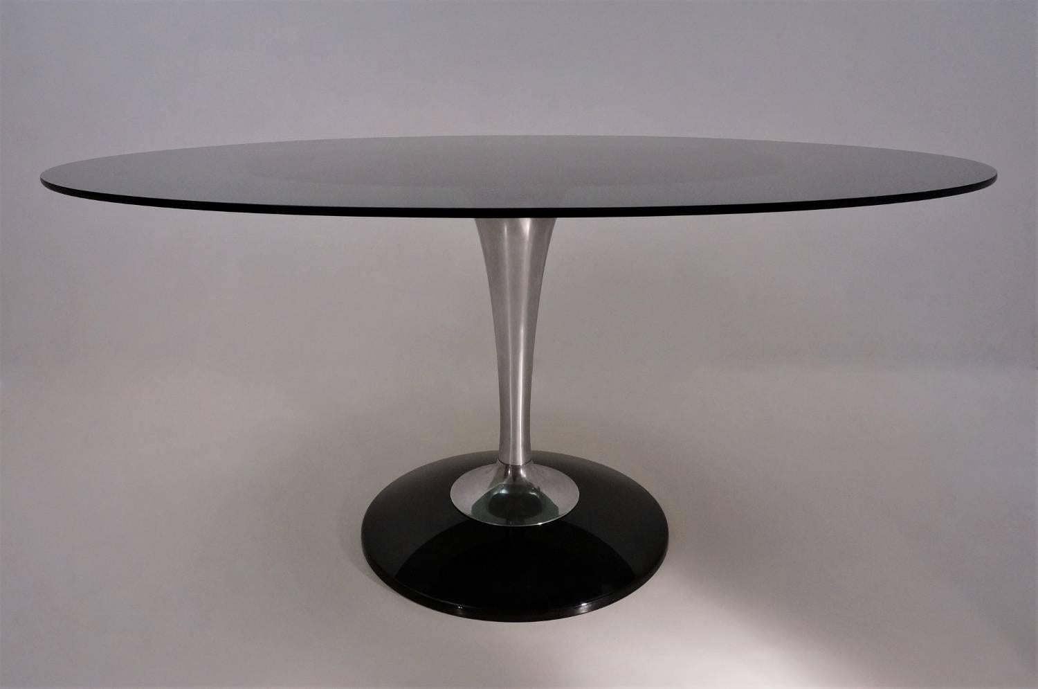 Chromcraft table, oval smoked glass top on an aluminium & acrylic pedestal base, 1970s circa, American.
This dining table has been gently cleaned while respecting the vintage patina and is ready to use.

Part of the Marquise dining set this table