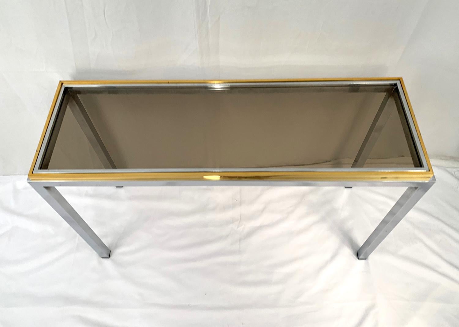 Splendid console in chromed metal and brass designed by Willy Rizzo for Linea Flaminia, 1970s.

Splendide console en métal chromé et laiton dessiné par Willy Rizzo pour Linea Flaminia, 1970s.