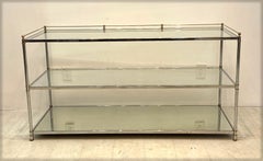 Chrome and Brass Console with Glass Shelves, circa 1980s