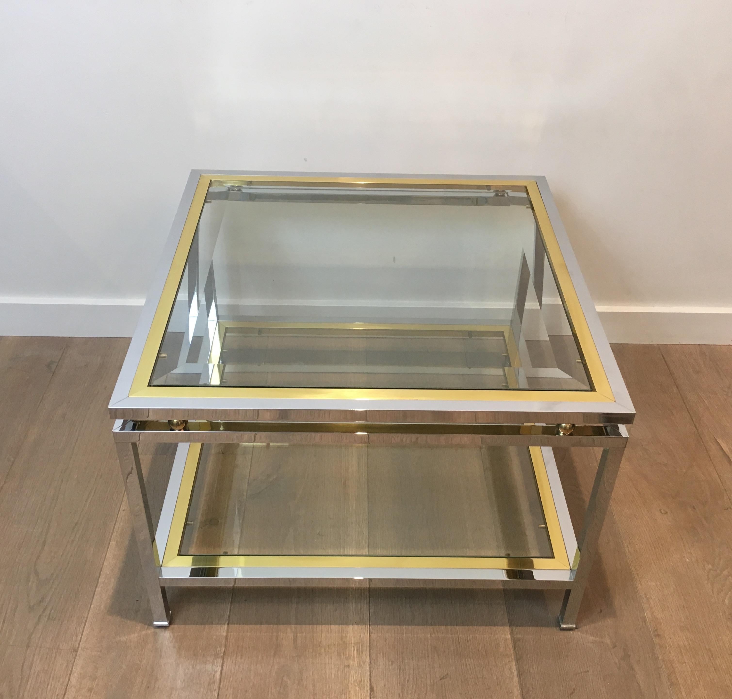 This design square side table is made of chrome and brass. This is a very nice model, heavy and of good quality that can be used as well as a small coffee table. This is a French work, circa 1970.