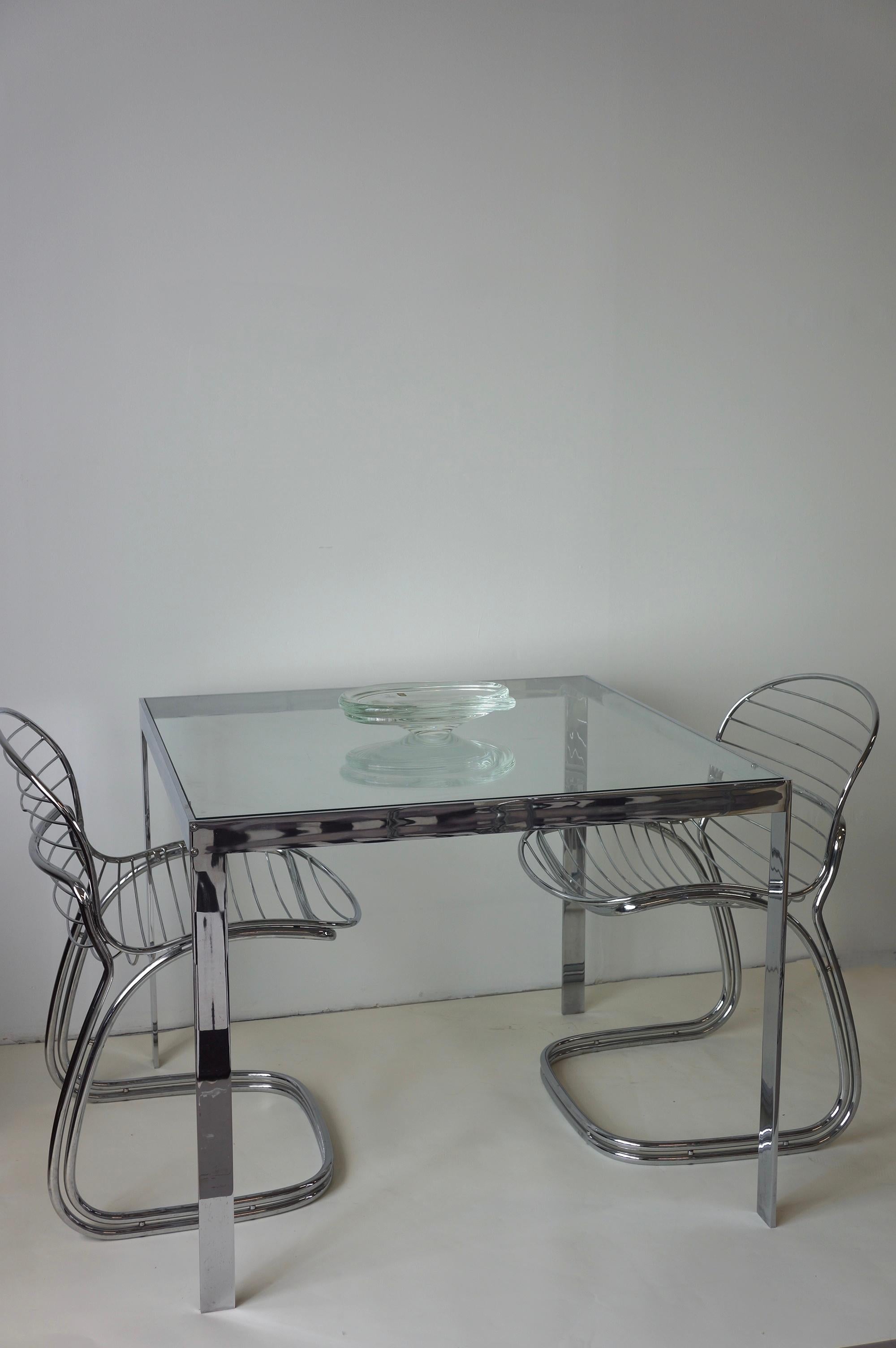 Chrome and glass dining table  In Fair Condition For Sale In Toronto, ON