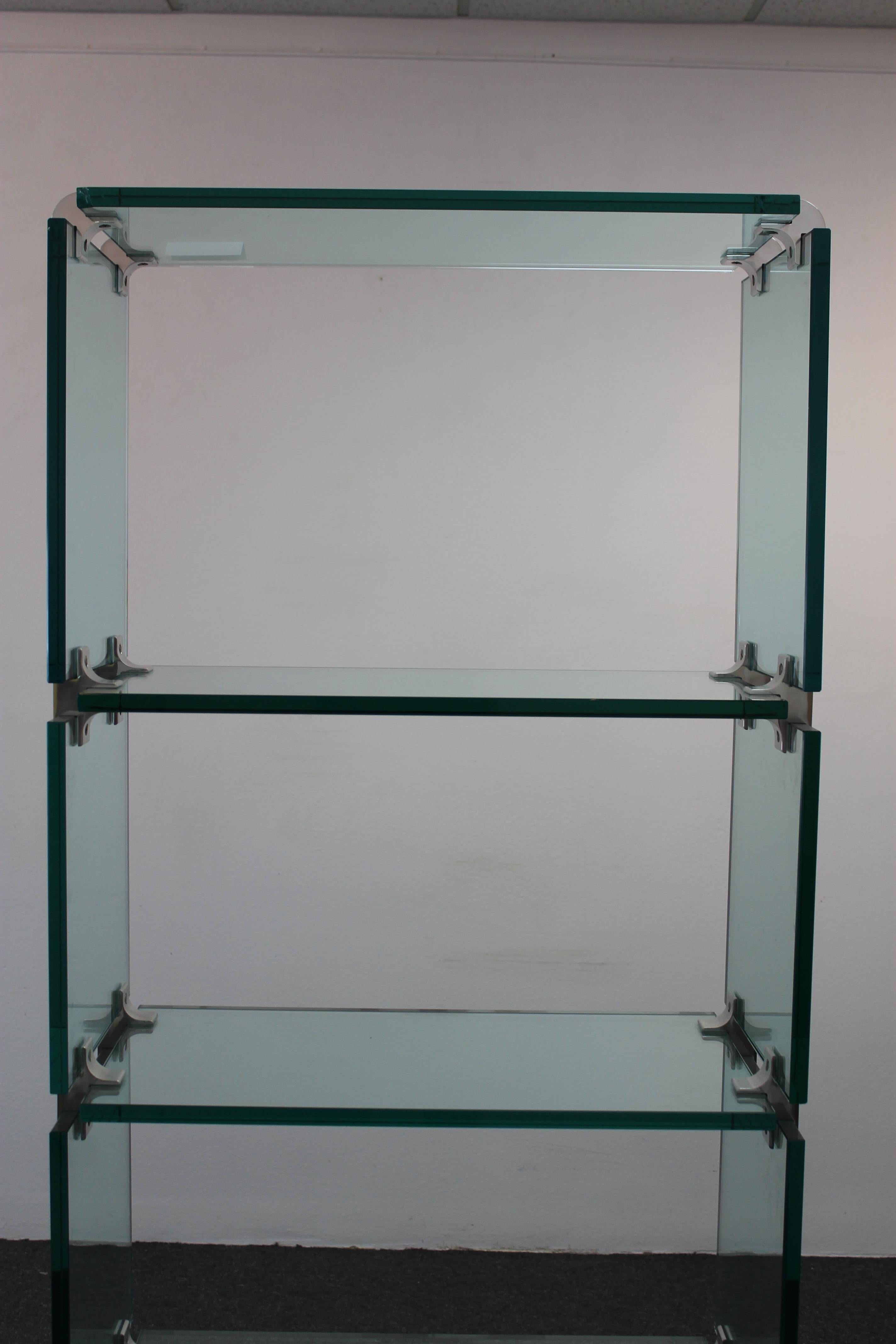 Polished aluminum and glass display case attributed to Leon Rosen for Pace Collection. Shelves measures 30.25