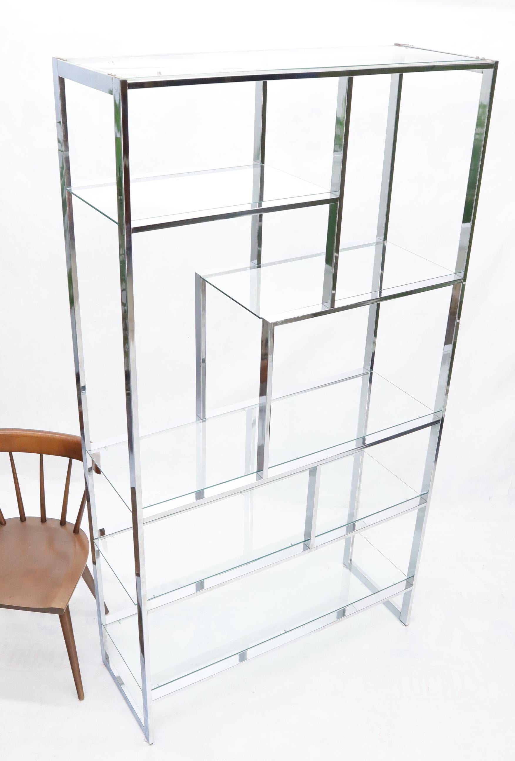Mid-Century Modern large chrome and glass étagère shelving wall unit.