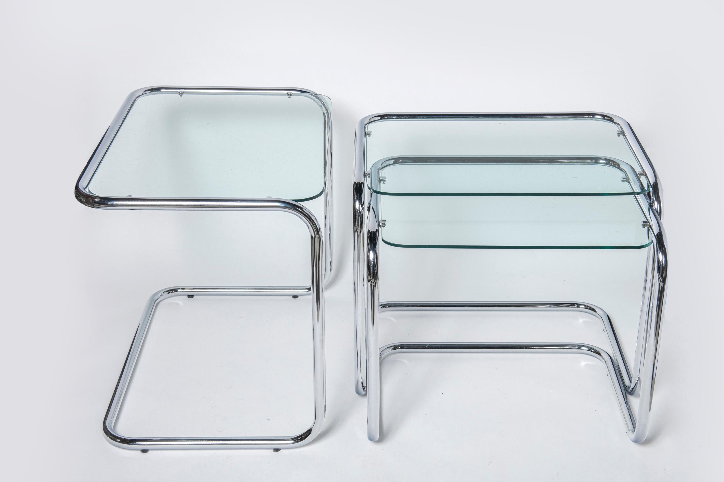 Chrome and glass nest tables Designed by Reinaldo Leiro and Arnoldo Gaite, 1970. In Good Condition For Sale In Buenos Aires, Buenos Aires