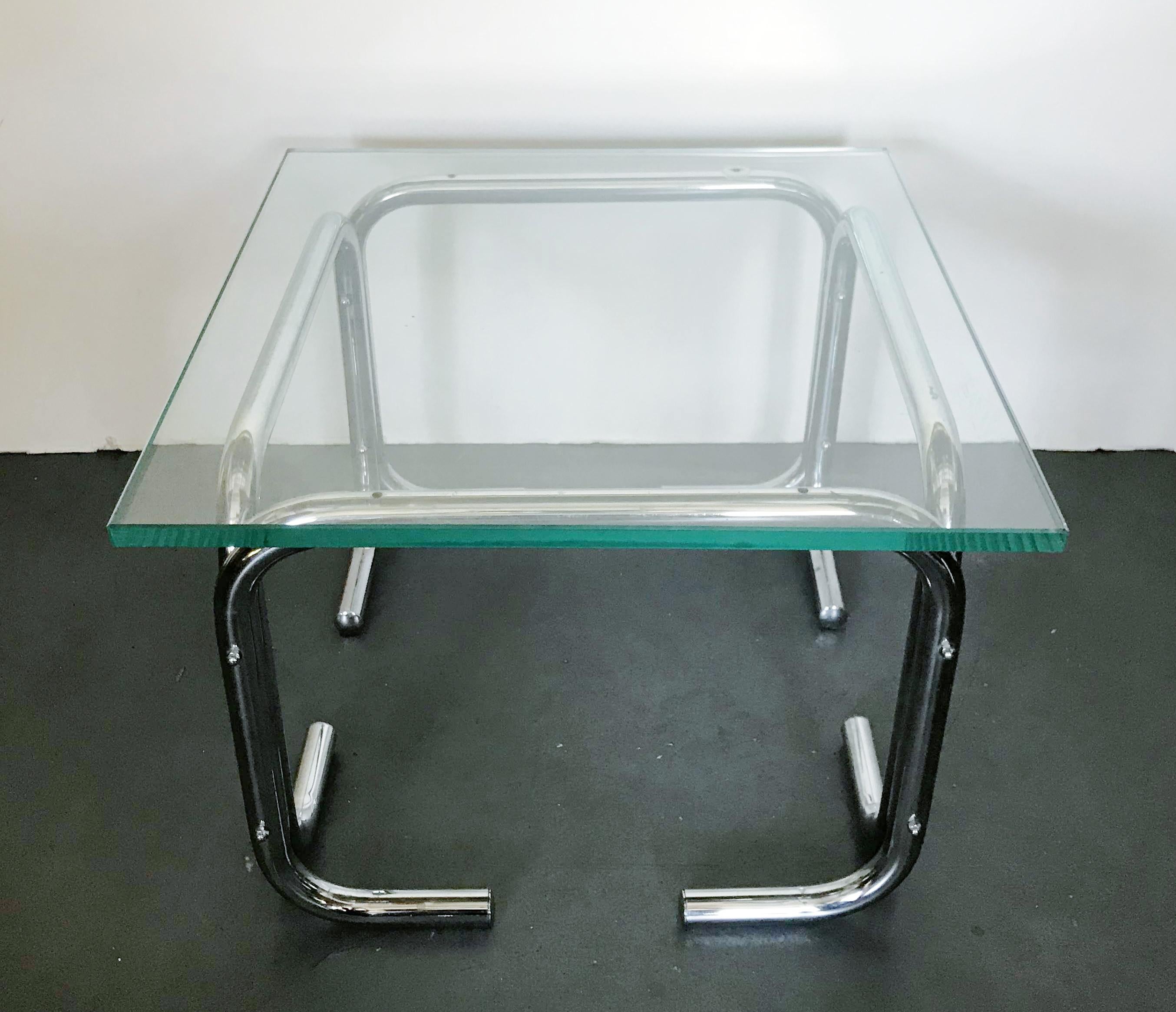 Vintage midcentury side table with tubular chrome base and thick square glass top / Made in the USA, circa 1970s
Measures: length 22 inches, width 22 inches, height 14.5 inches
1 available in stock in Palm Springs on FINAL CLEARANCE SALE for $649