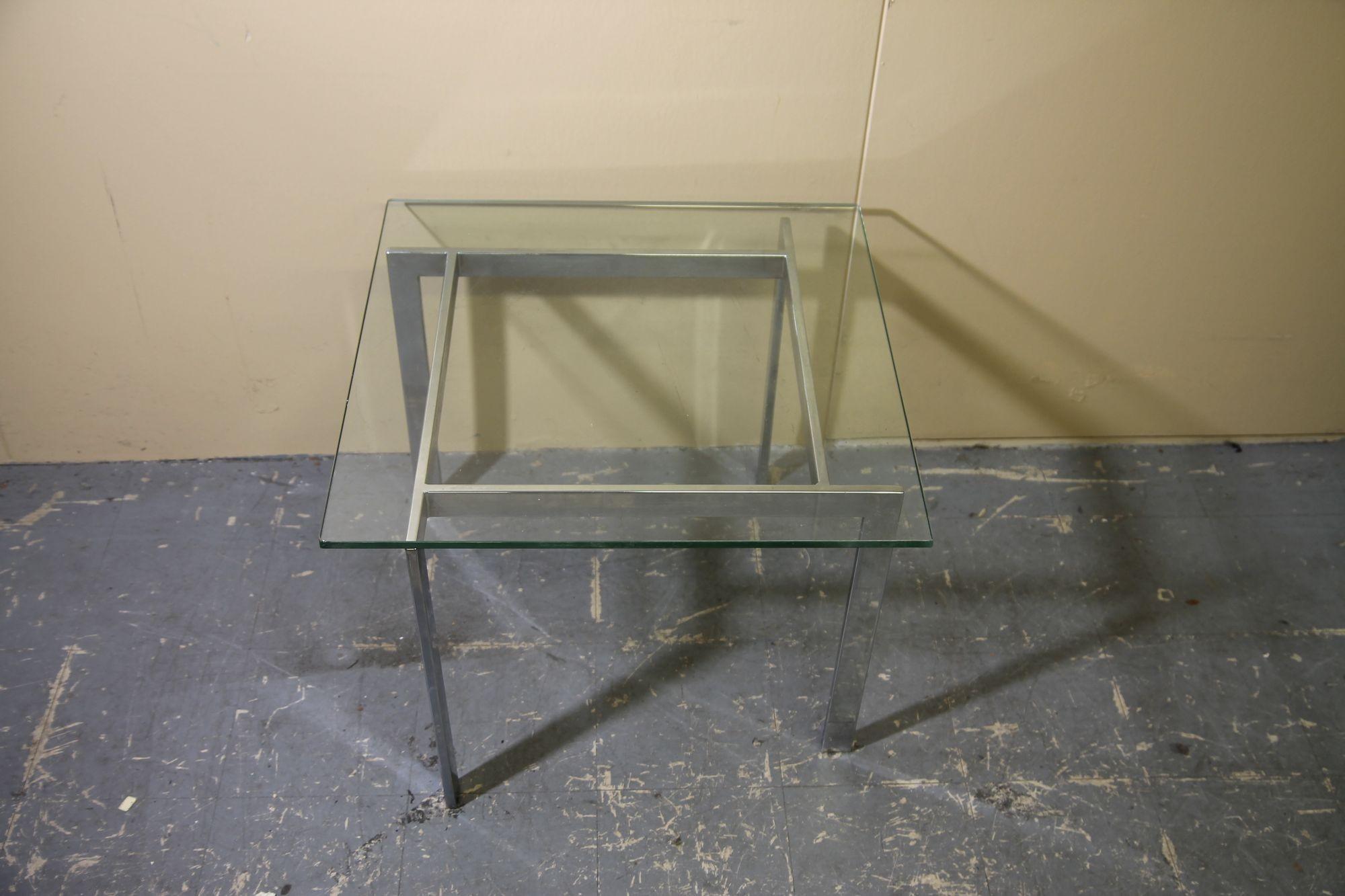 American Chrome and glass side table in the manner of Milo Baughman For Sale