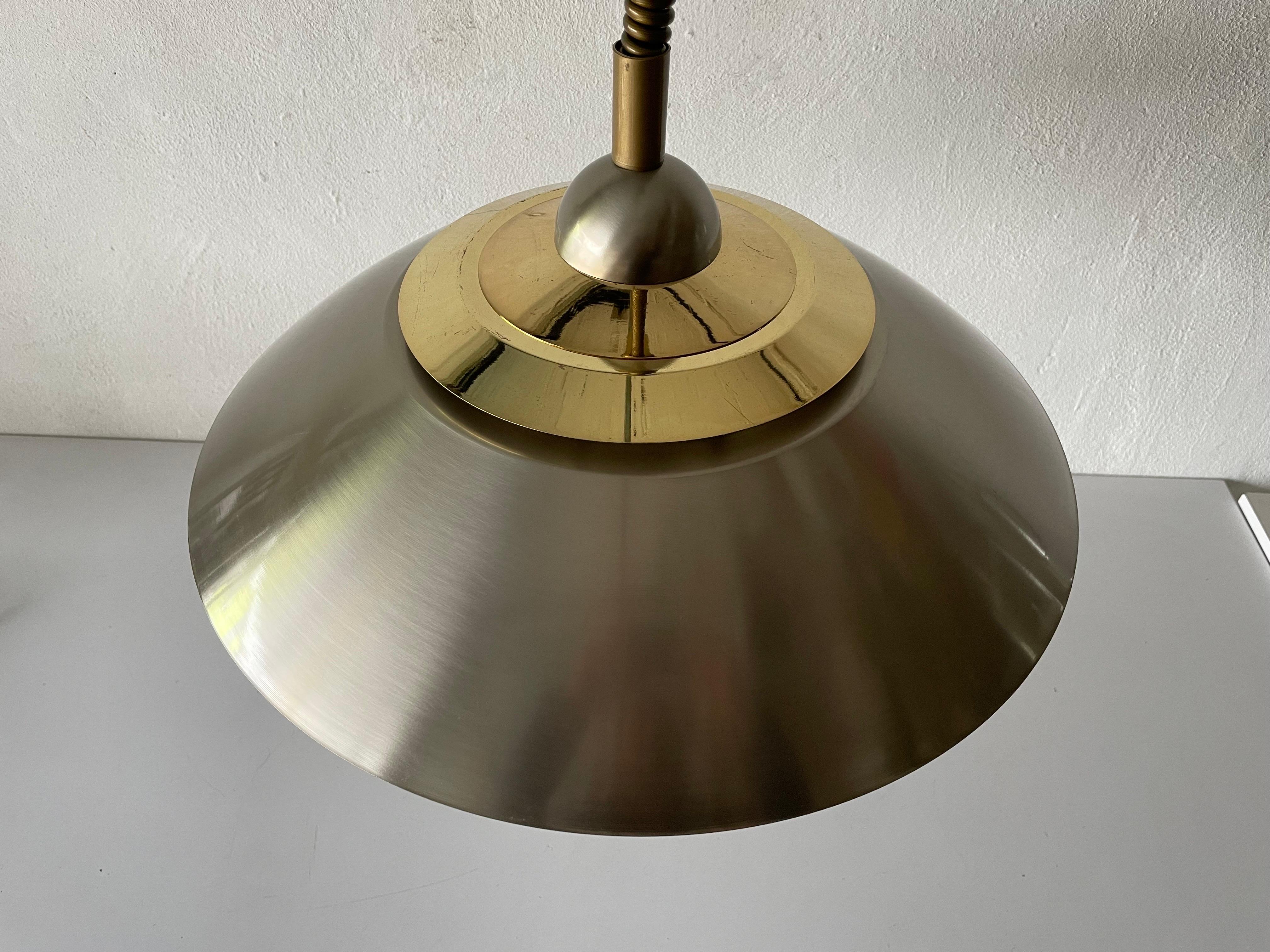 Chrome and Gold Metal pendant lamp by TZ, 1970s, Germany

Lampshade is in good condition and very clean. 
This lamp works with E27 light bulb. 
Wired and suitable to use with 220V and 110V for all countries.

Measures: 

Shade diameter and
