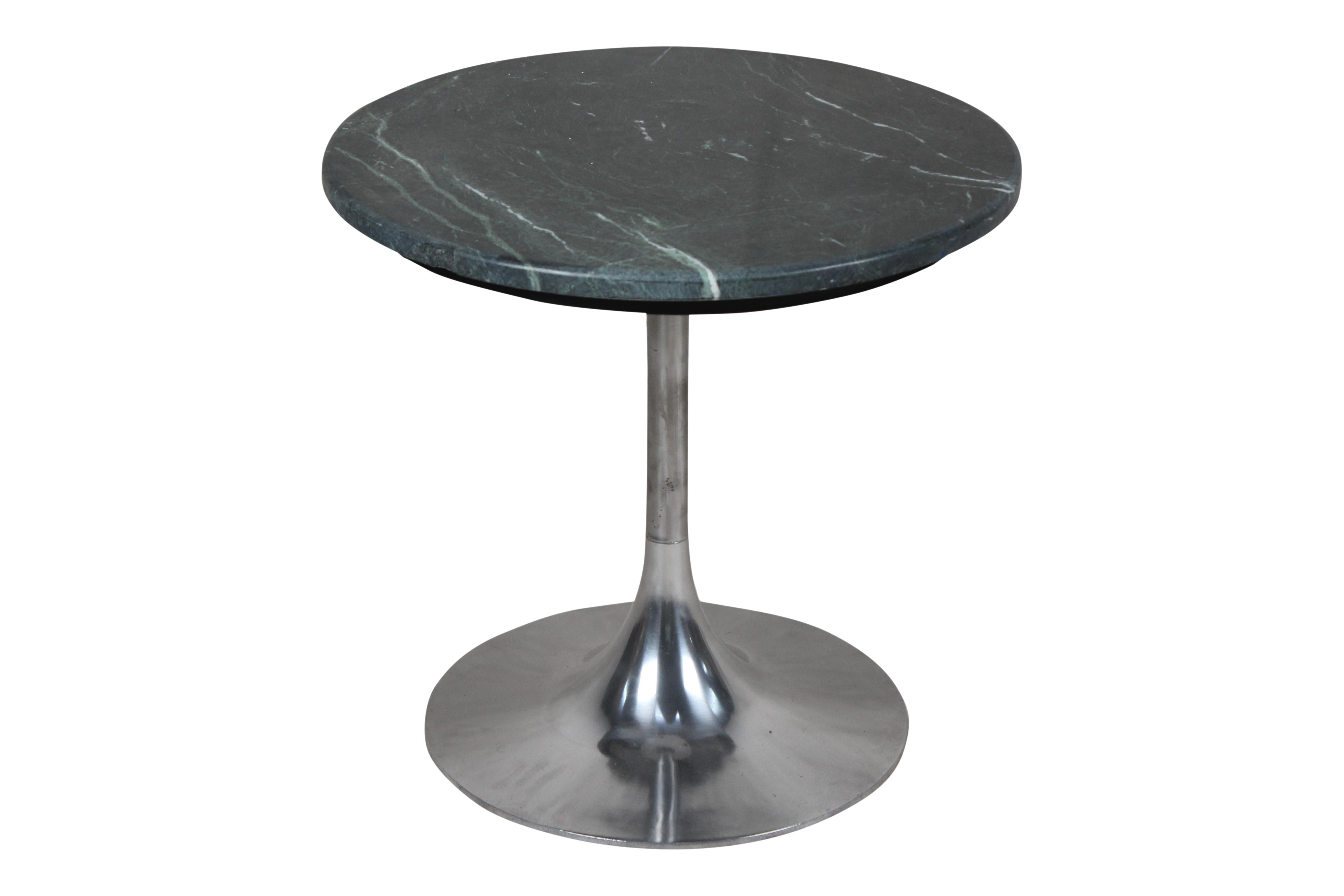 A Mid-Century Modern chrome base with a trumpet or tulip shape design. It has an affixed green marble top which is in excellent condition and has a lovely matrix within the stone. Use as a side or end table or even as a coffee or cocktail table. It