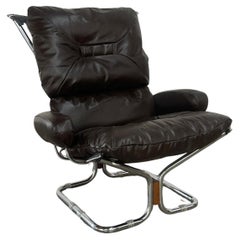 Vintage Chrome and leather lounge chair by Westnofa