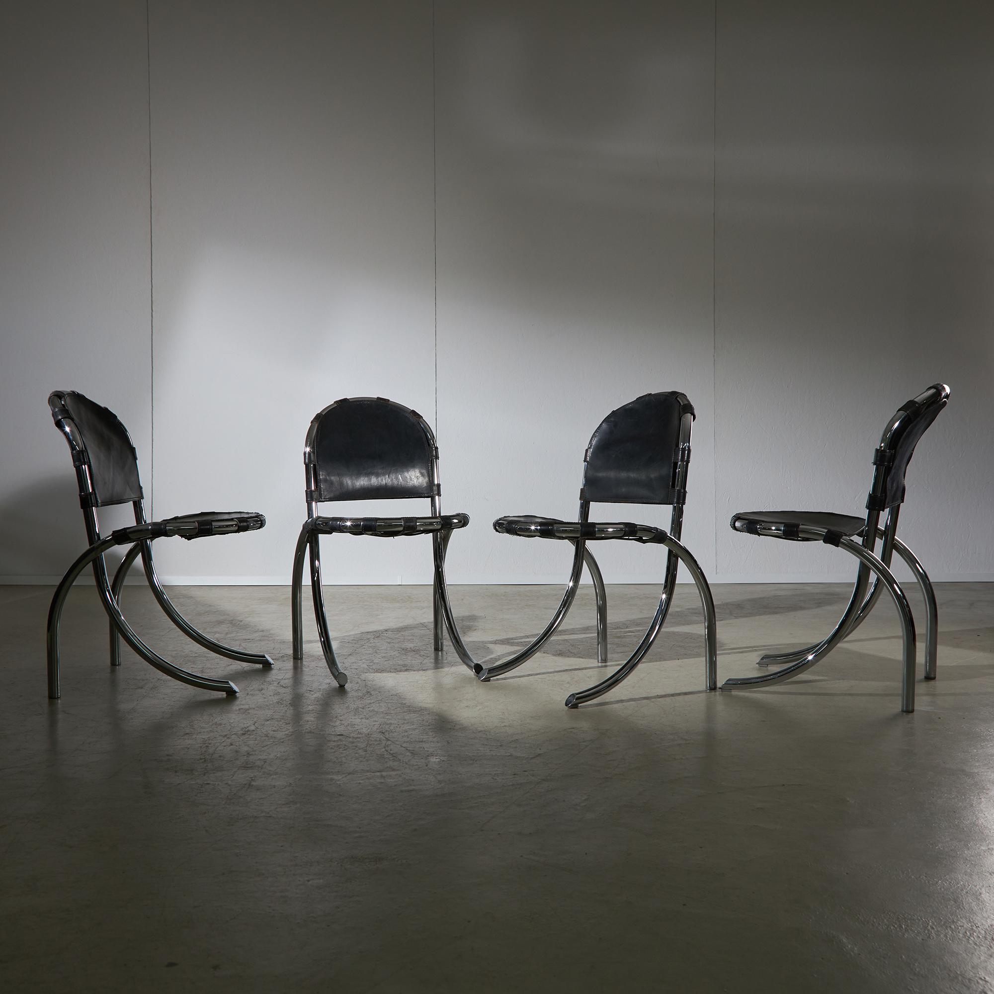 Set of 4 vintage Medusa chairs with a curved chrome frame and thick black leather seat and back. Designed by Alberto Bazzani for Studio Tetrarch in the 1970s, these one-of-a-kind chairs are not only functional but will also provide an unmatched